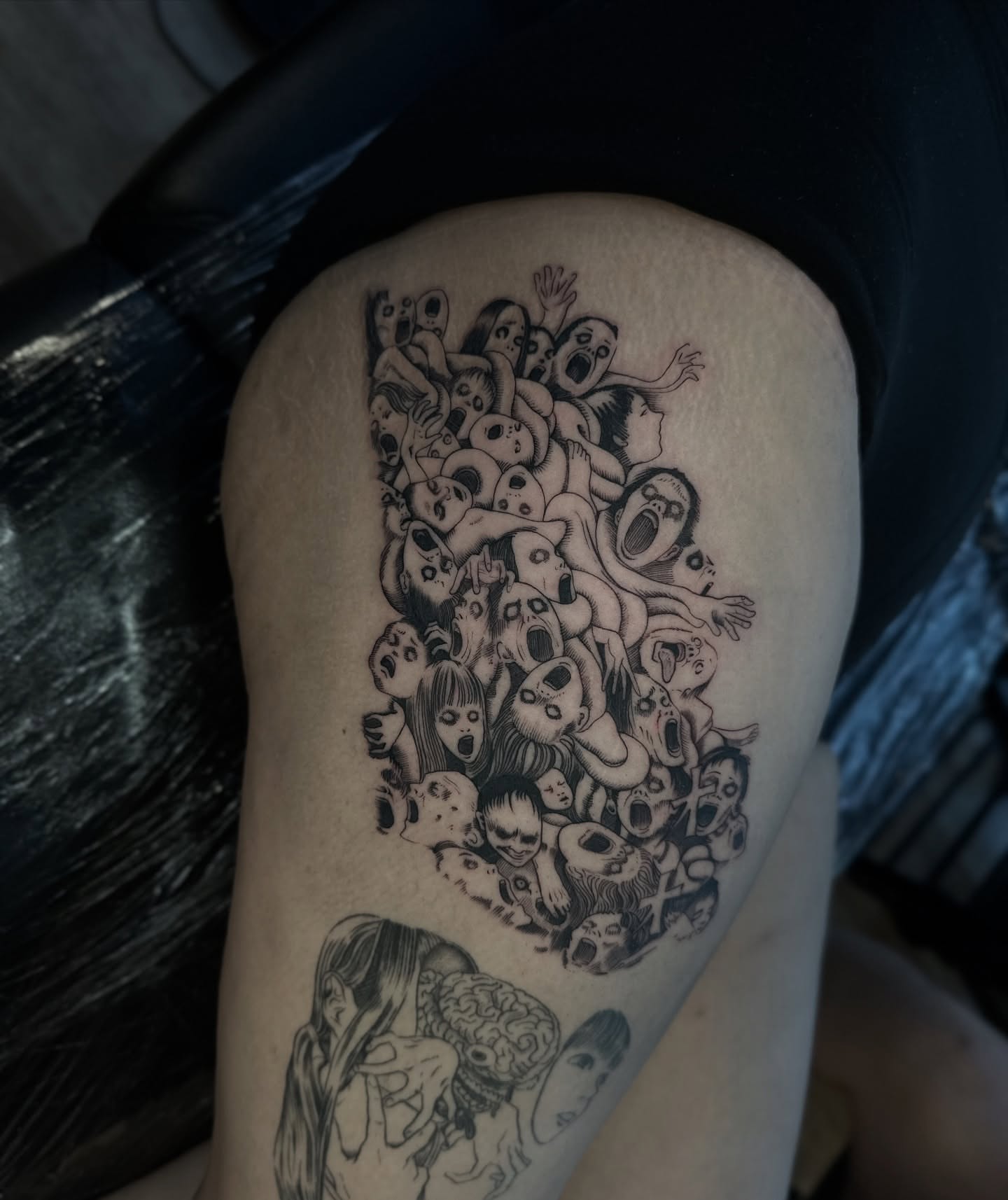 Crowd of screaming faces dark realism tattoo on the thigh by πΈππππ