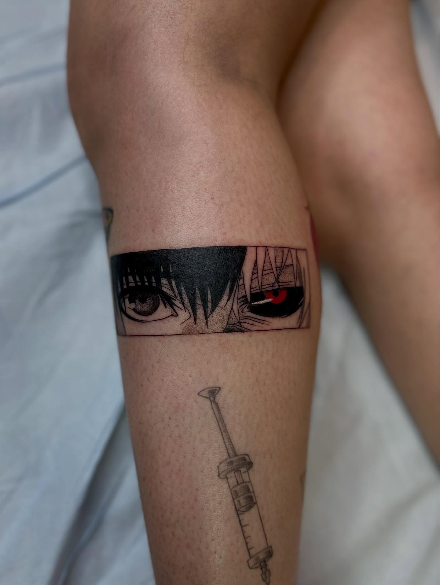 Anime eyes anime tattoo on the forearm by christian martinez