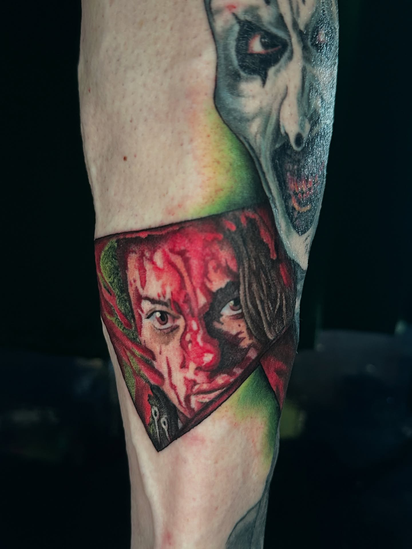 Joker realism tattoo on the forearm by Sam Minneci