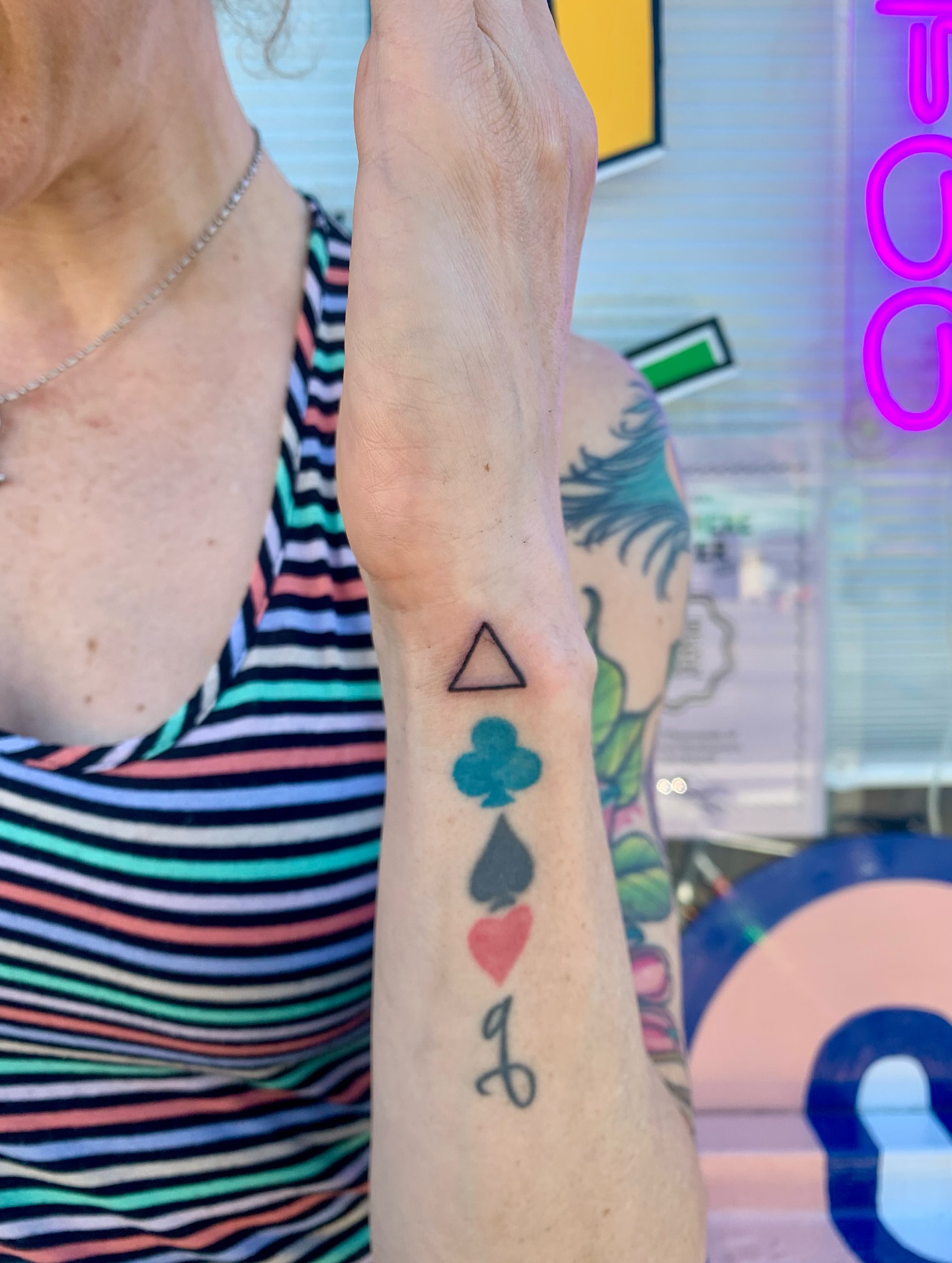 Playing card symbols geometric tattoo on the forearm by CharlieBoy