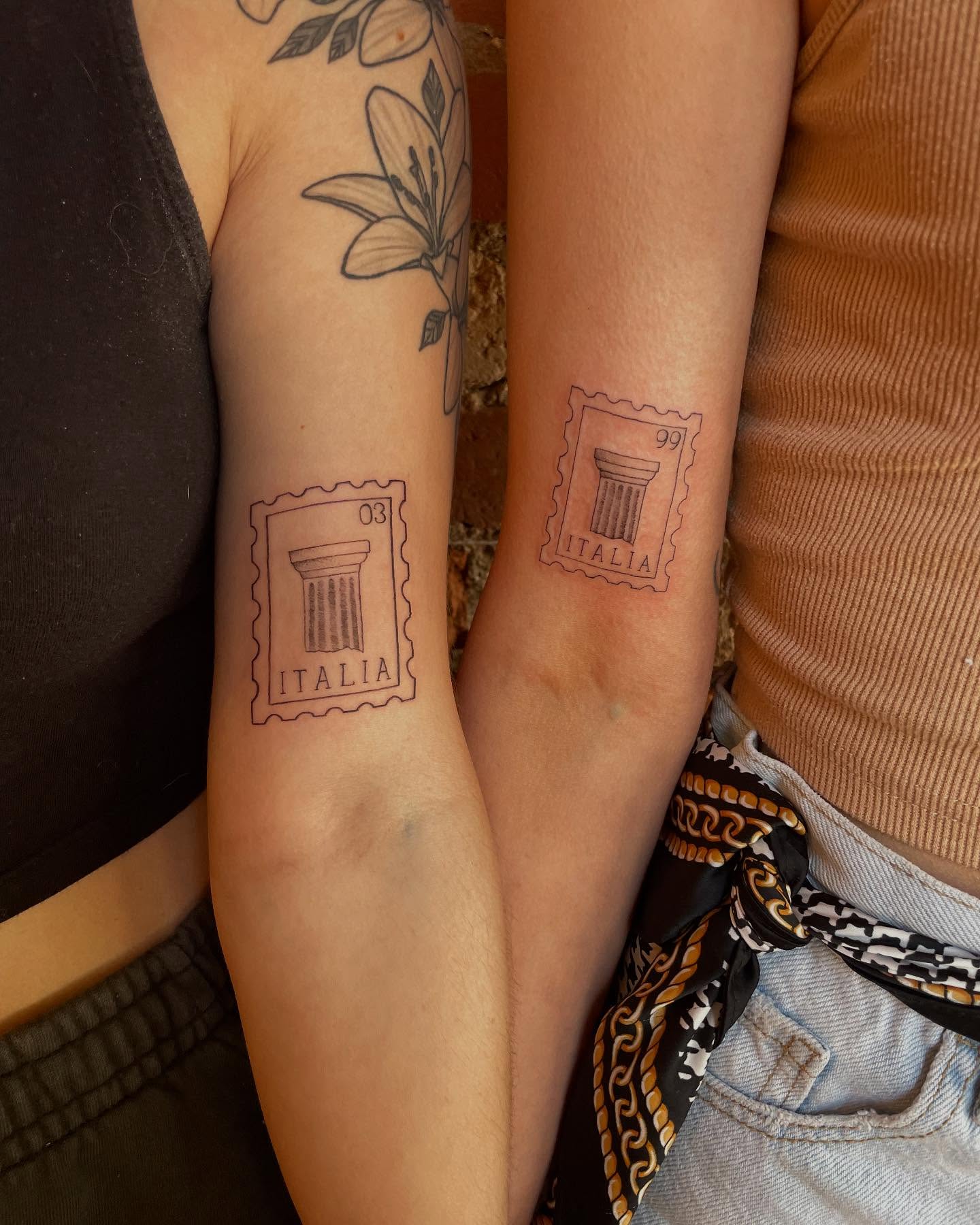 Italian postage stamp black and grey tattoo on the forearm by madison, Cincinnati