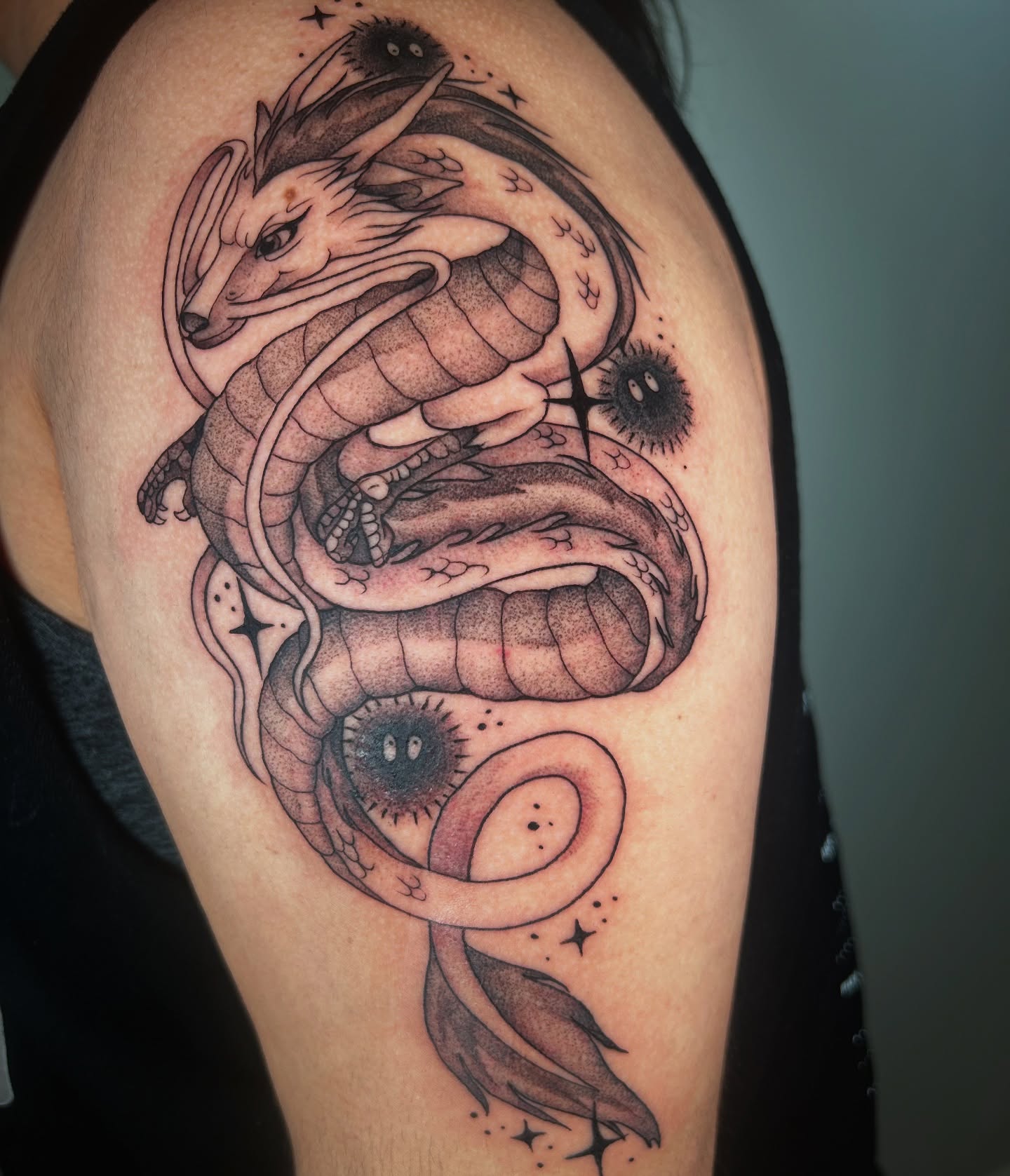 Dragon dotwork tattoo on the shoulder by Chloe Marie