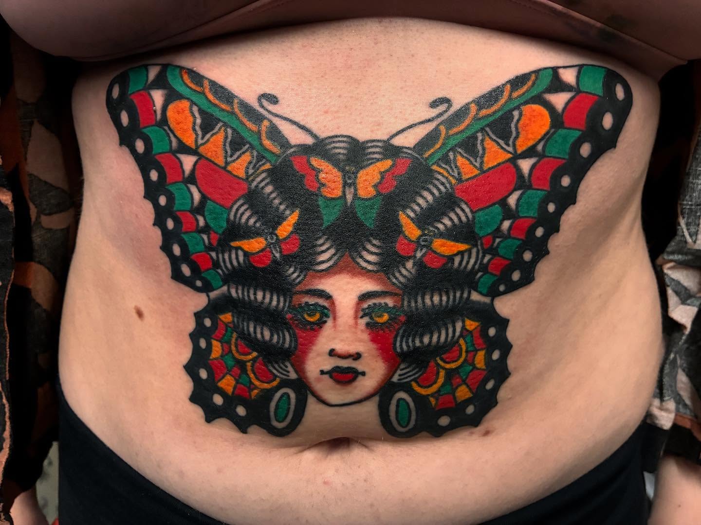 Butterfly American traditional tattoo on the torso by Chrissie
