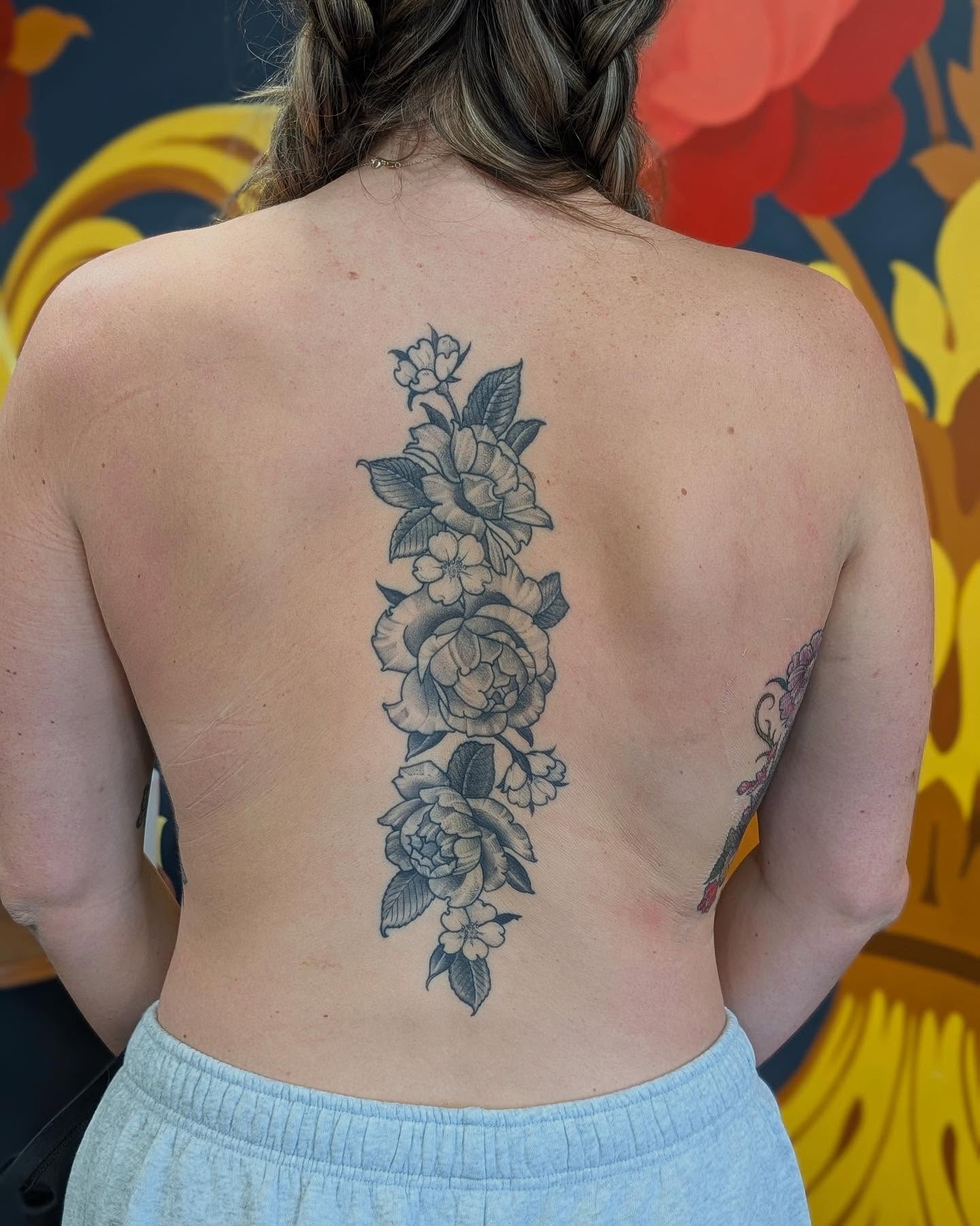 Floral arrangement black and grey tattoo on the back by English Cousins, Nashville, Tennessee