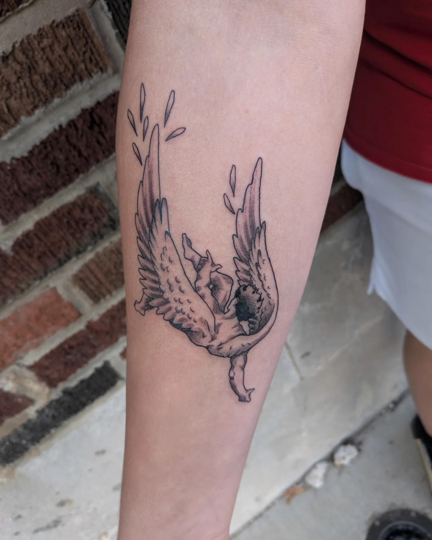 Angel wings black and grey tattoo on the forearm by Damon 🥀