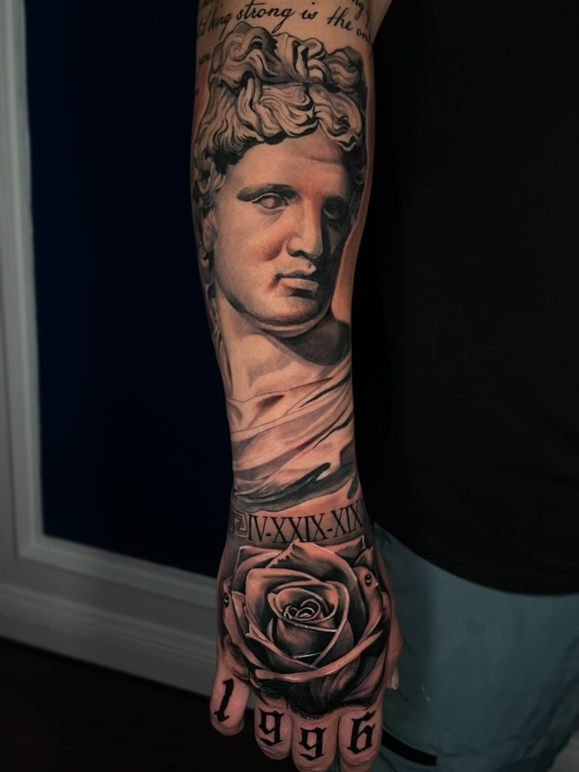 Statue bust realism tattoo on the forearm by Angie Morales, Laredo, Texas