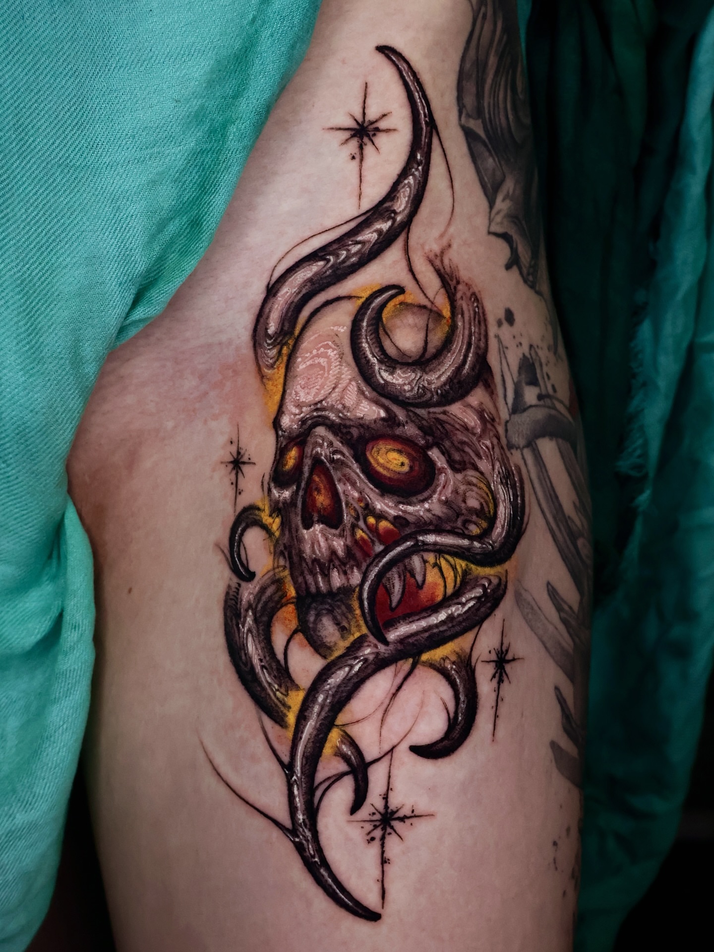 Skull with tentacles dark realism tattoo on the forearm by Dark tattoo