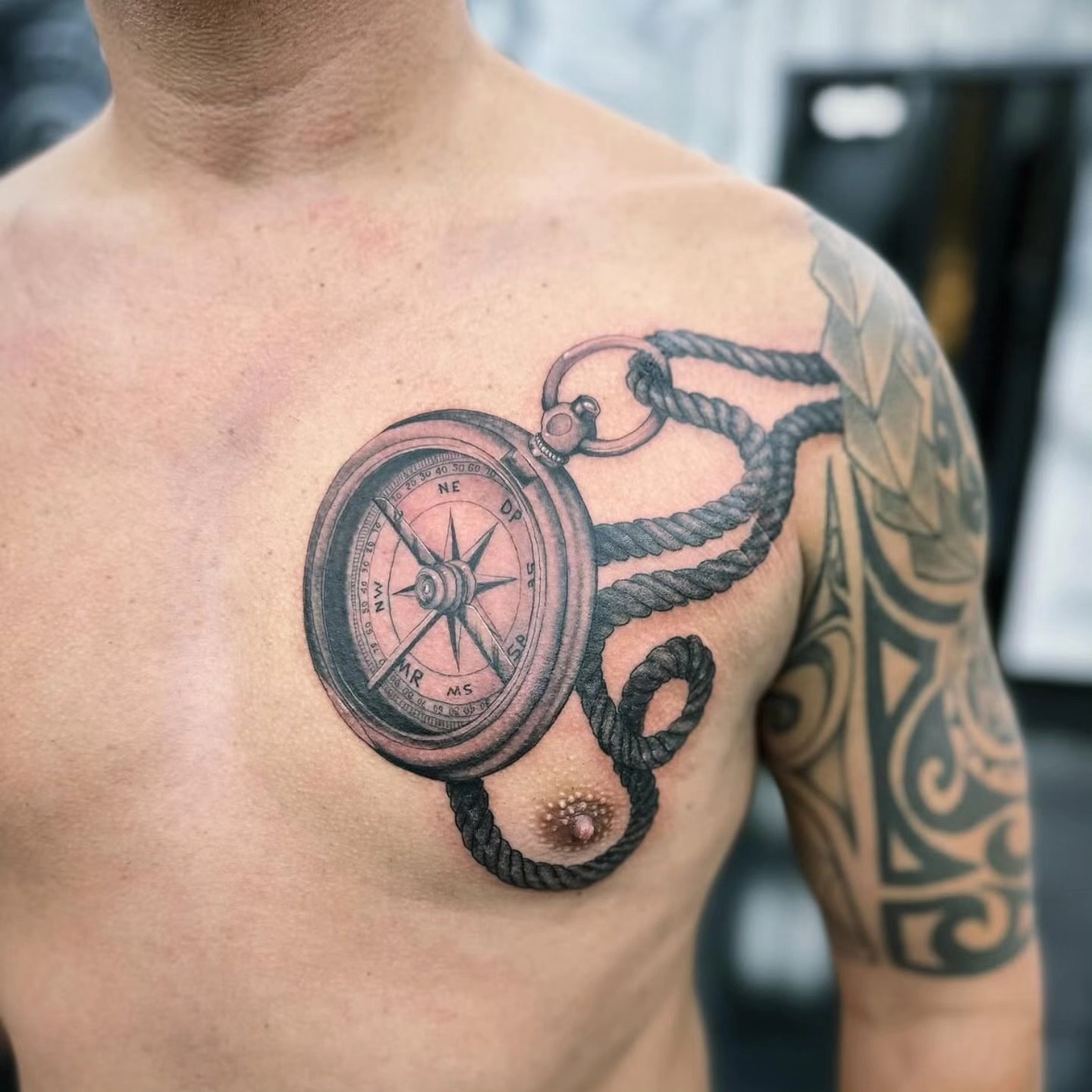 Tattoo by @tattoos_near_me — black_and_grey, realism