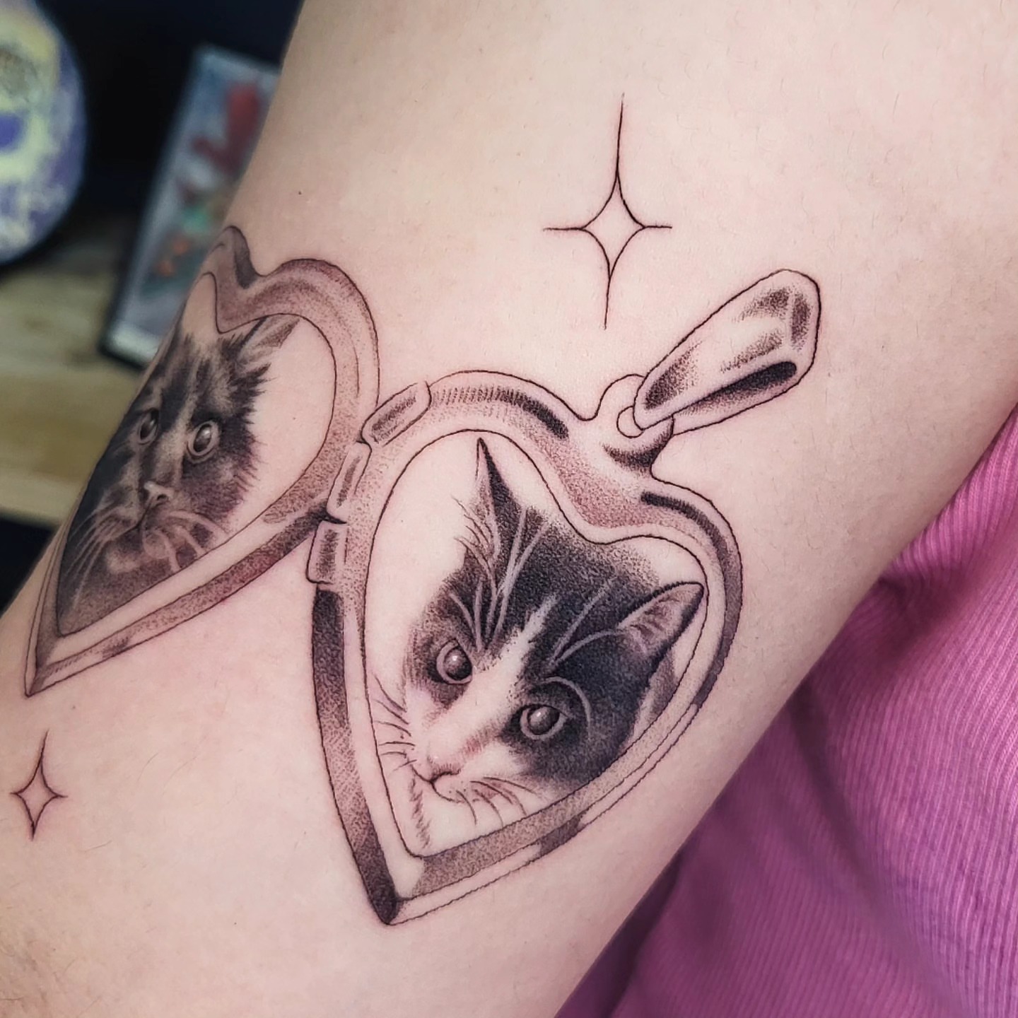 Cat in mirror realism tattoo on the forearm by Brenda Juarez - Tattoo Artist
