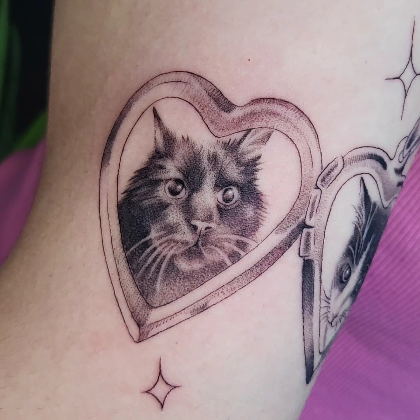 Cat in heart dotwork tattoo on the thigh by Brenda Juarez - Tattoo Artist