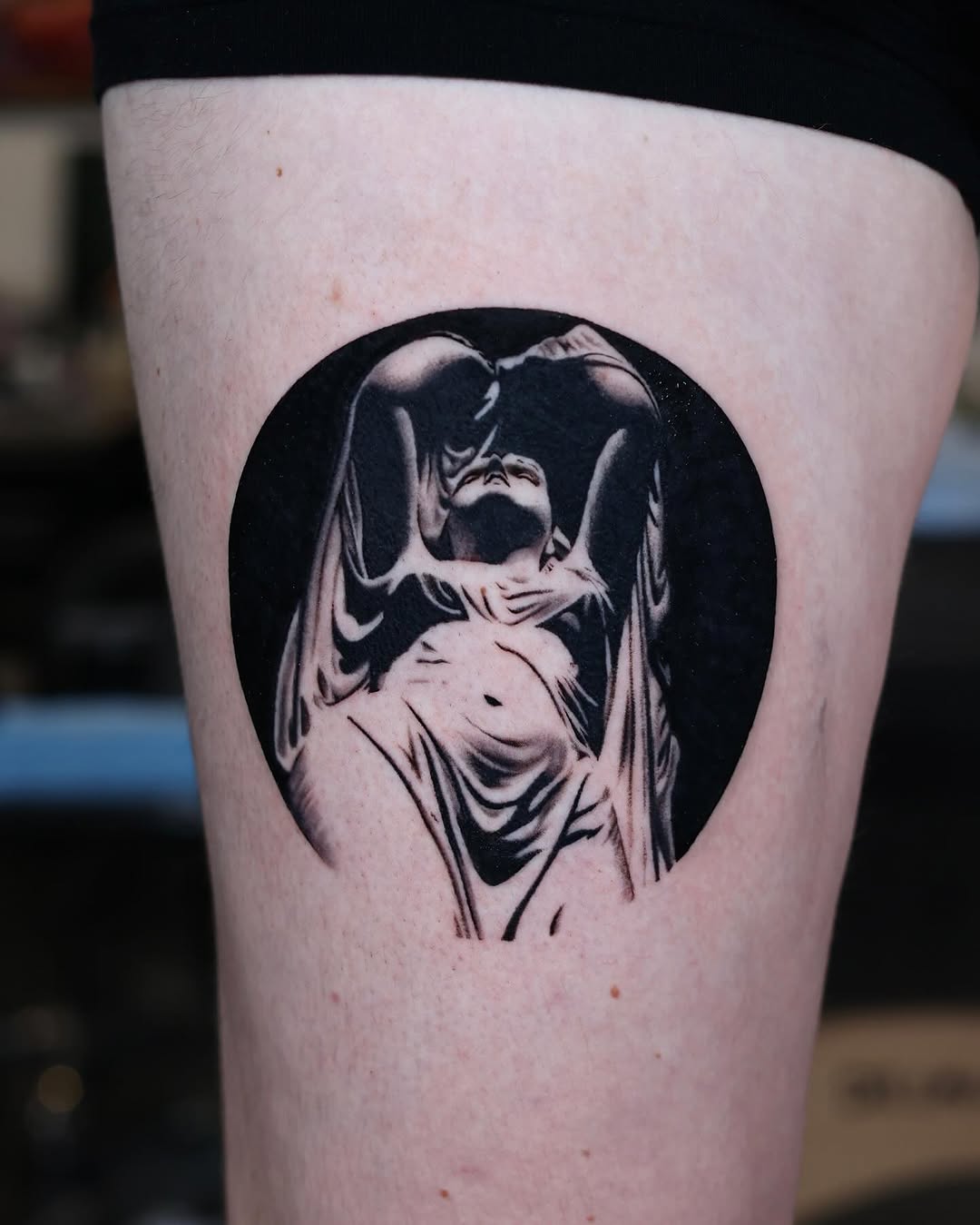 Figure in drapery dark art tattoo on the thigh by Scott!!!