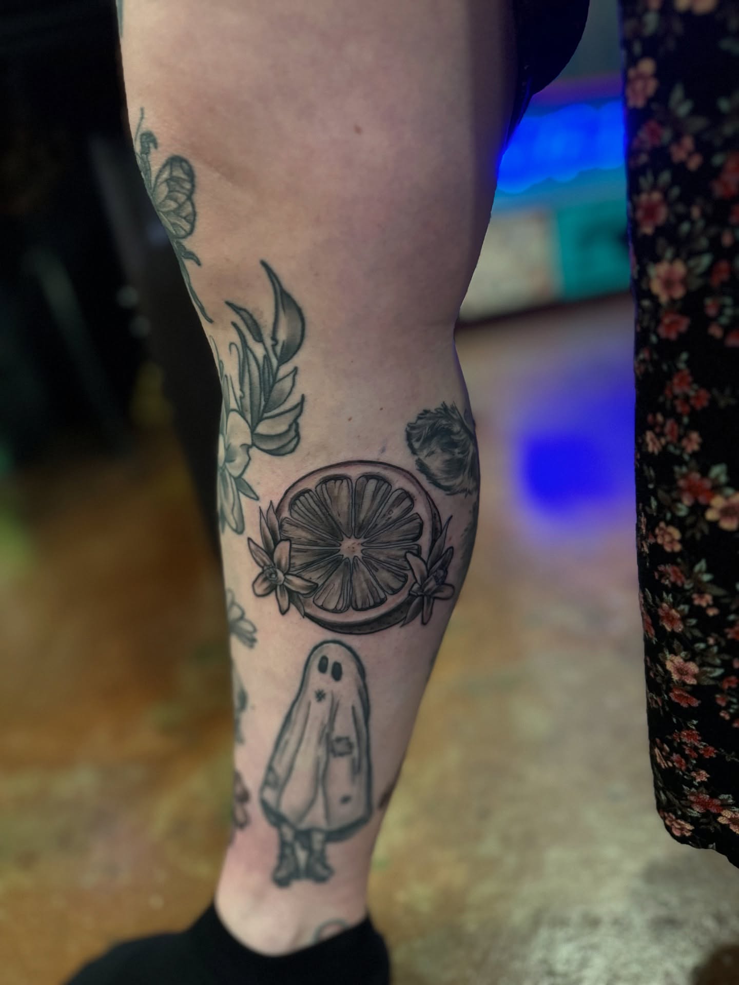 Slice of lemon ghost black and grey tattoo on the forearm by David C. McGhee