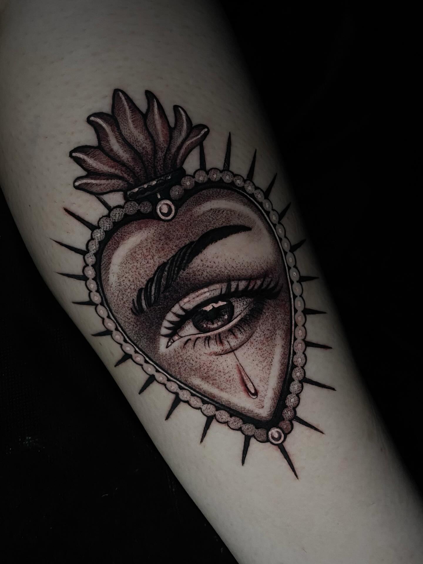 Heart with eye dotwork tattoo on the forearm by 𝔗𝔞𝔶𝔩𝔬𝔯 𝔈𝔩𝔦𝔷𝔞𝔟𝔢𝔱𝔥, Tulsa, Oklahoma