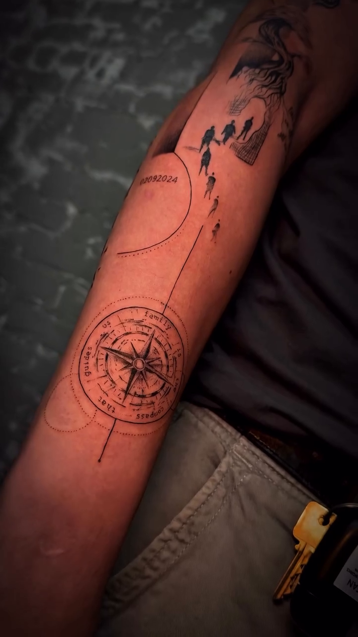 Compass and landscape sketch tattoo on the forearm by Nyc Tattoo Manhattan