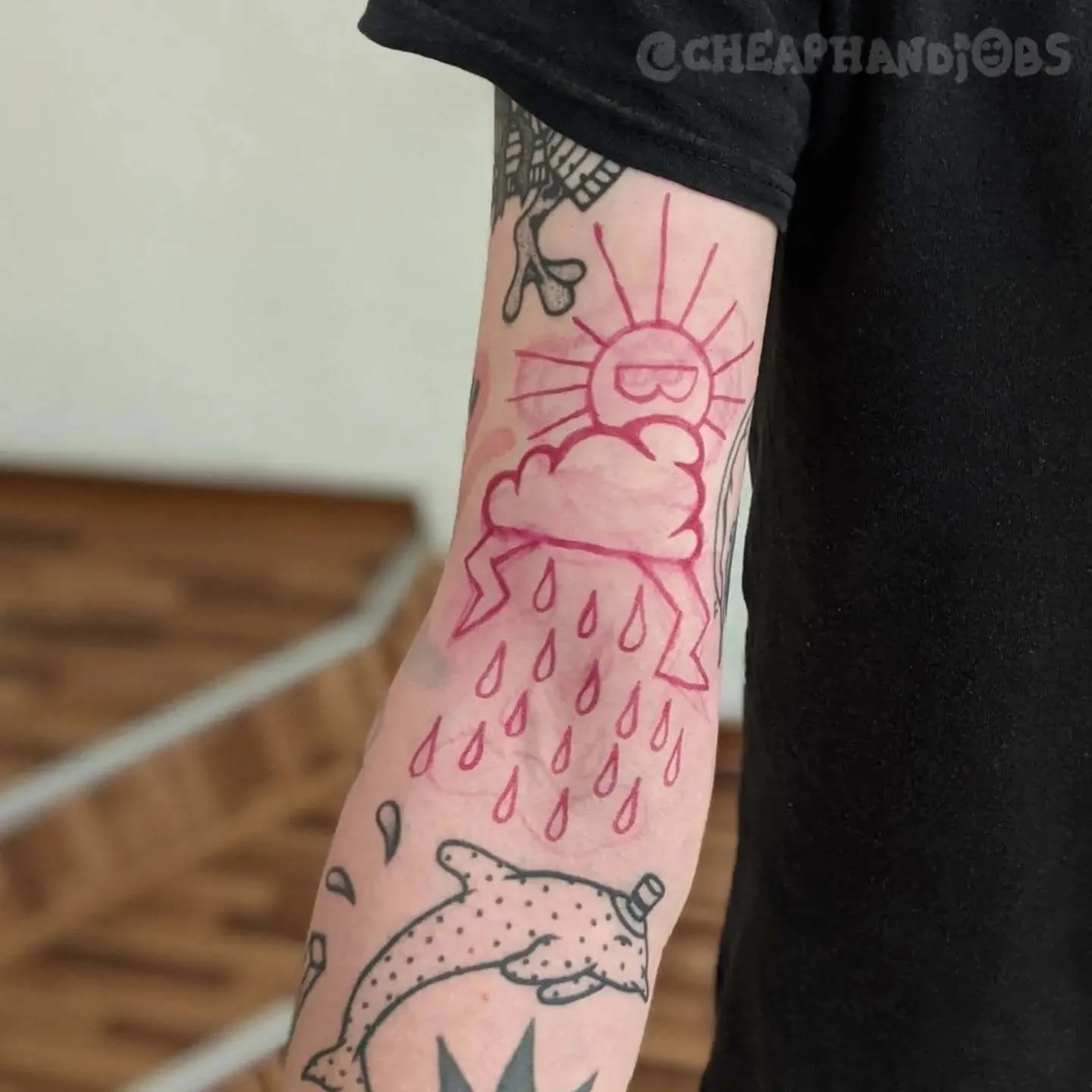 Rain cloud with sun dotwork tattoo on the forearm by @cheaphandjobs, Leipzig, Germany