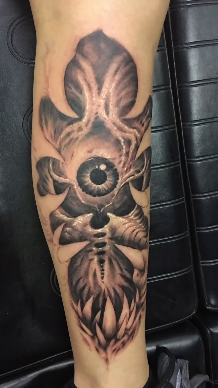 Biomechanical eye with organic elements realism tattoo by Jason Oz, Denver, Colorado
