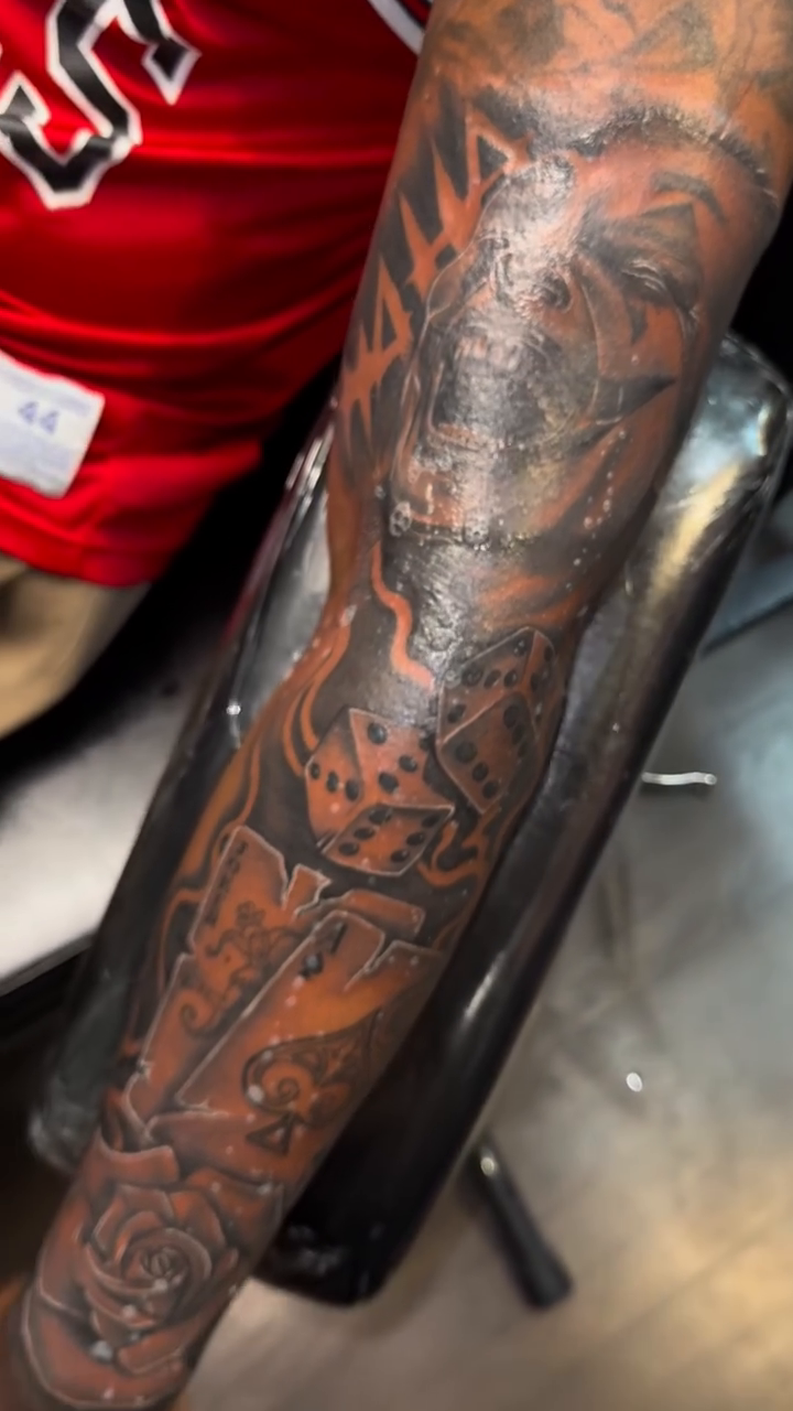Playing cards, rose, and skull realism tattoo by Licensed Tattoo Artist πΈπ»