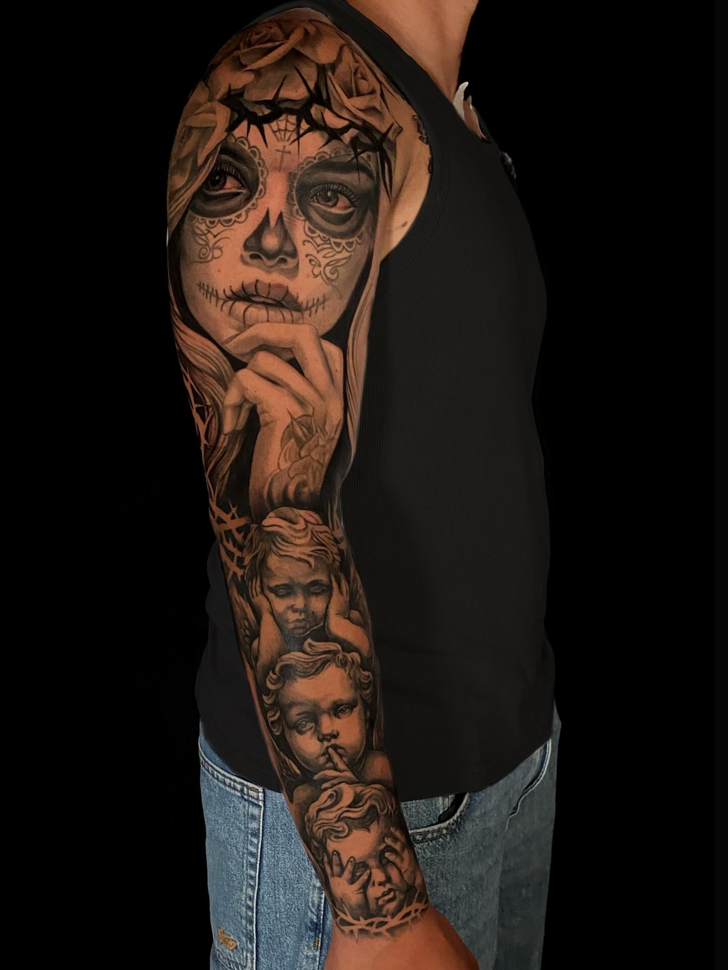 Sugar skull dark realism tattoo on the upper arm by Marquin π§π·