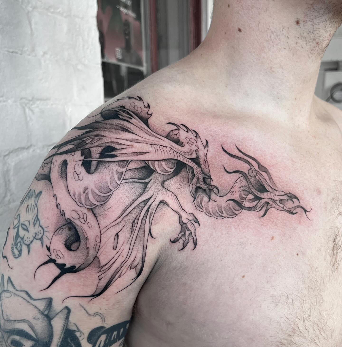 Tattoo by @apriljaytattoo — black_and_grey, dotwork