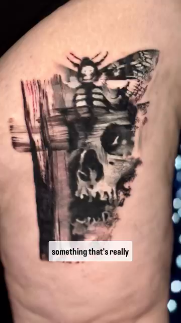 Skull with moth and cross realism tattoo by Travis Thorpe