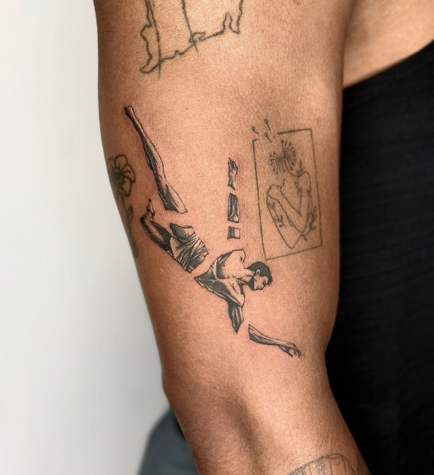 Diver black and grey tattoo on the forearm by Miro Ink Tattoo