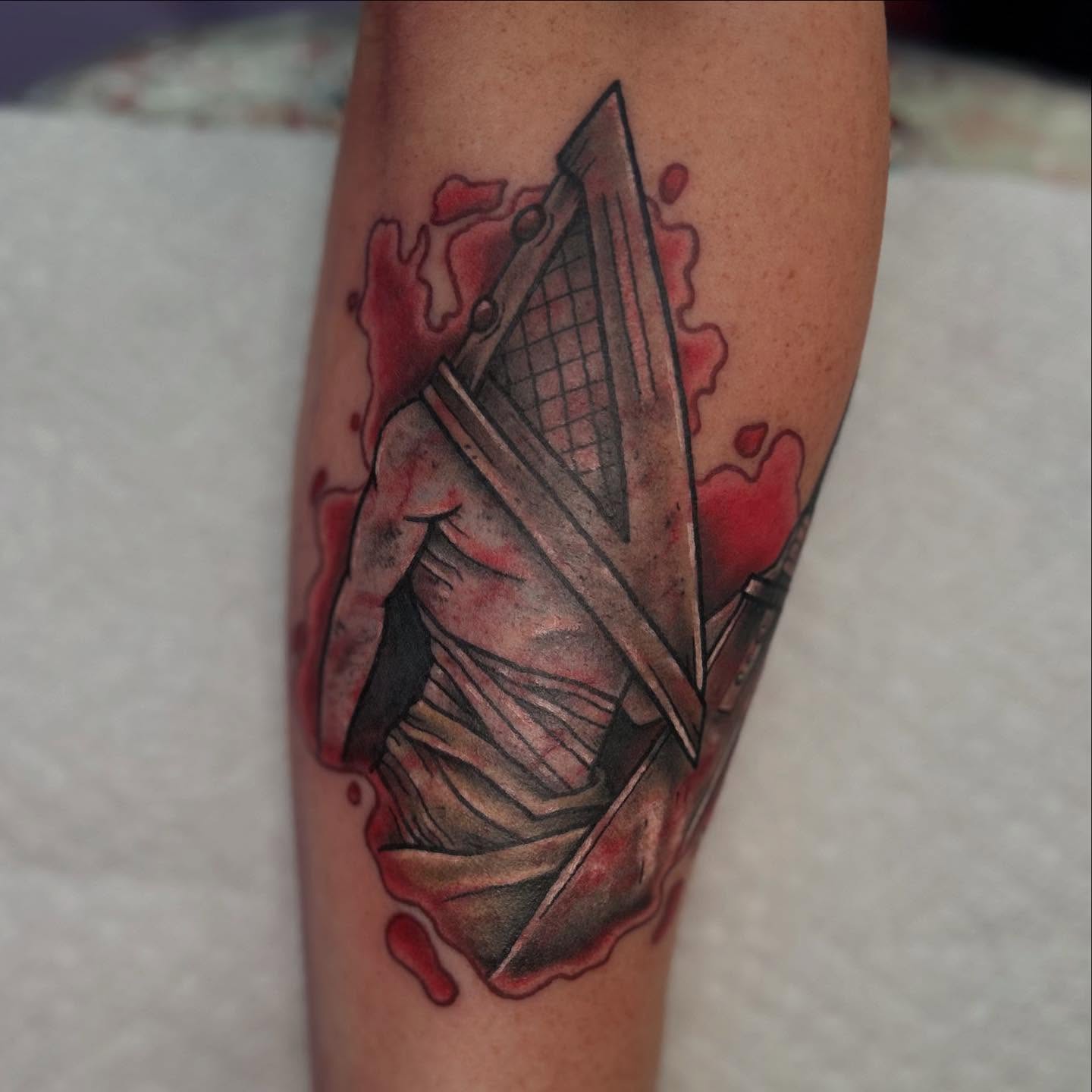 Gun geometric tattoo on the forearm by Abby Watts, Columbus, Ohio