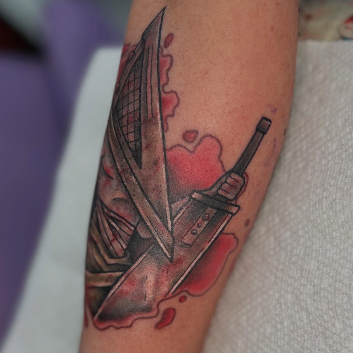 Knife and blood realism tattoo on the forearm by Abby Watts, Columbus, Ohio