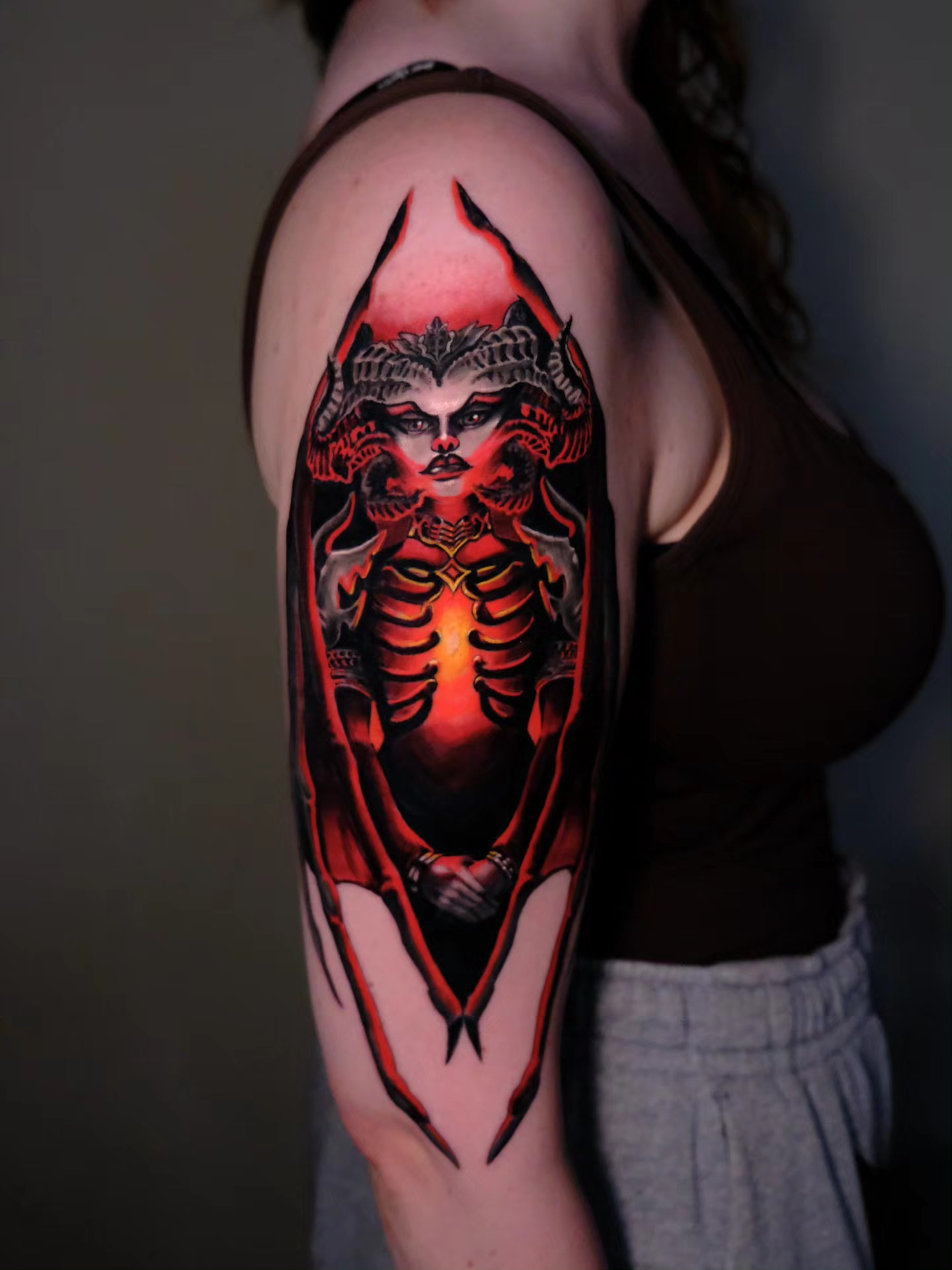 Female figure dark realism tattoo on the upper arm by Tash  - Seattle Tattoo Artist