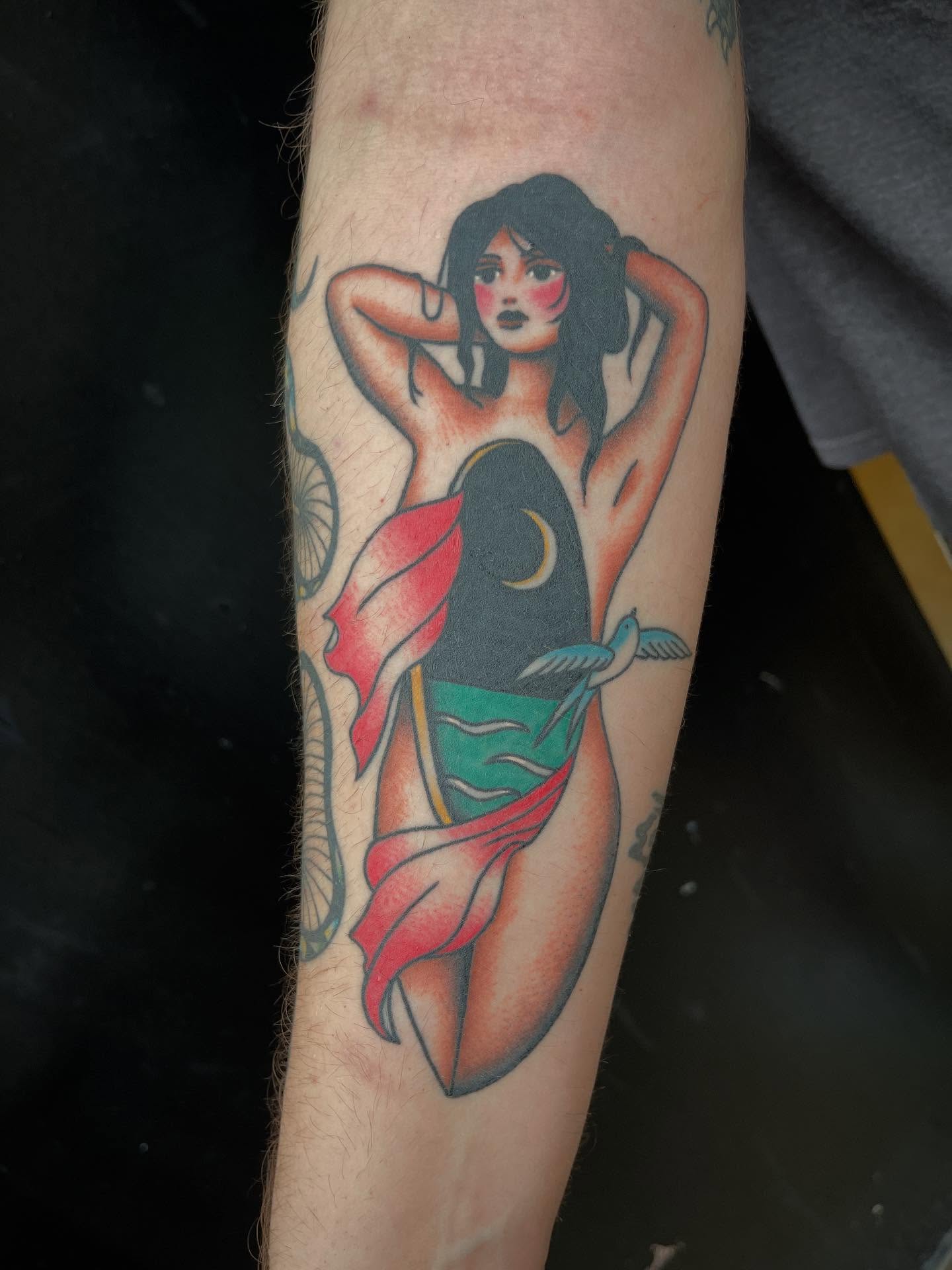 Mermaid American traditional tattoo on the forearm by Marqui Watling