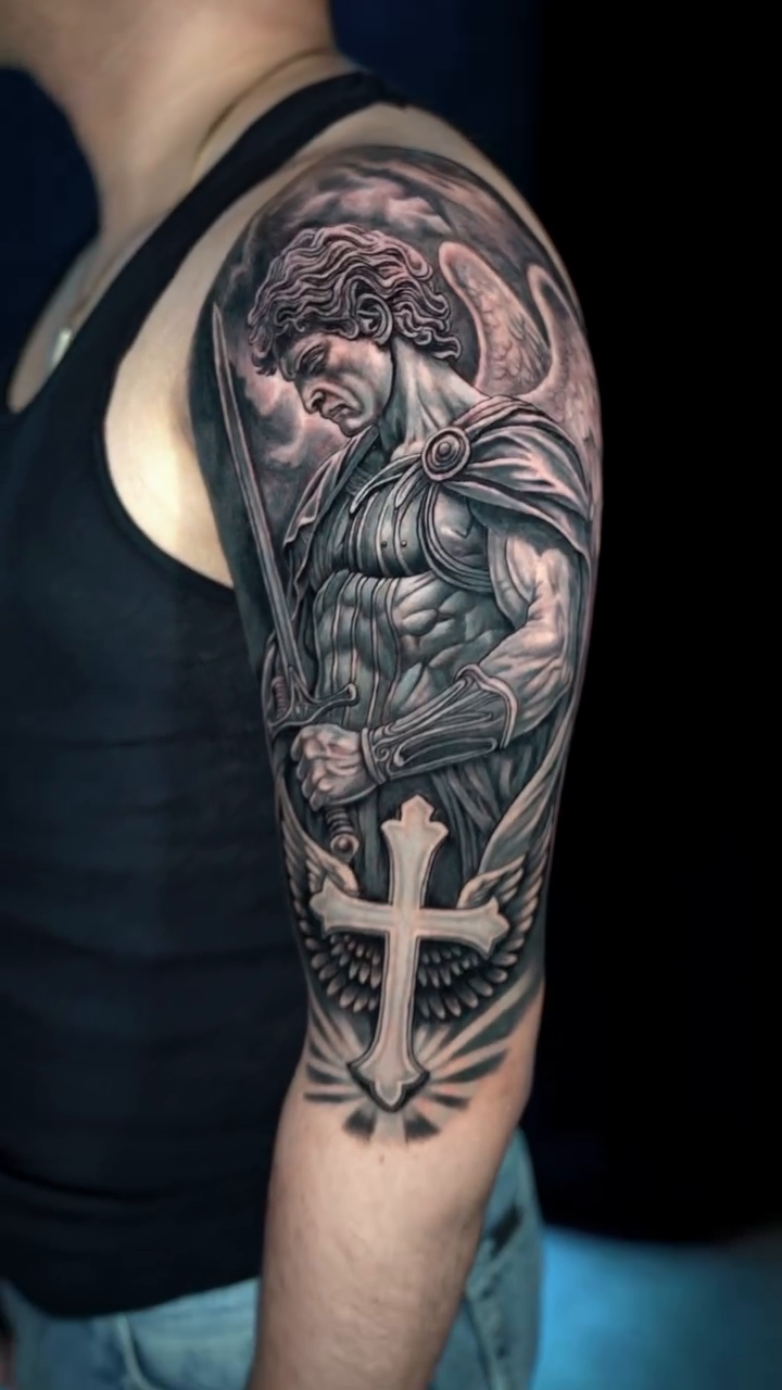 Angel with sword and cross realism tattoo by Ricardo javier Gil, Dallas, Texas