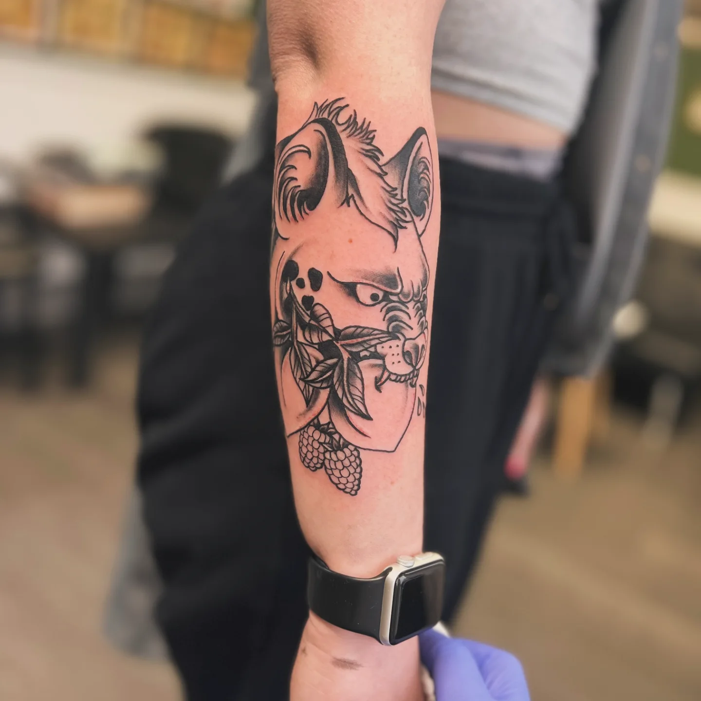 Pig with leaves black and grey tattoo on the forearm by Luna Faye