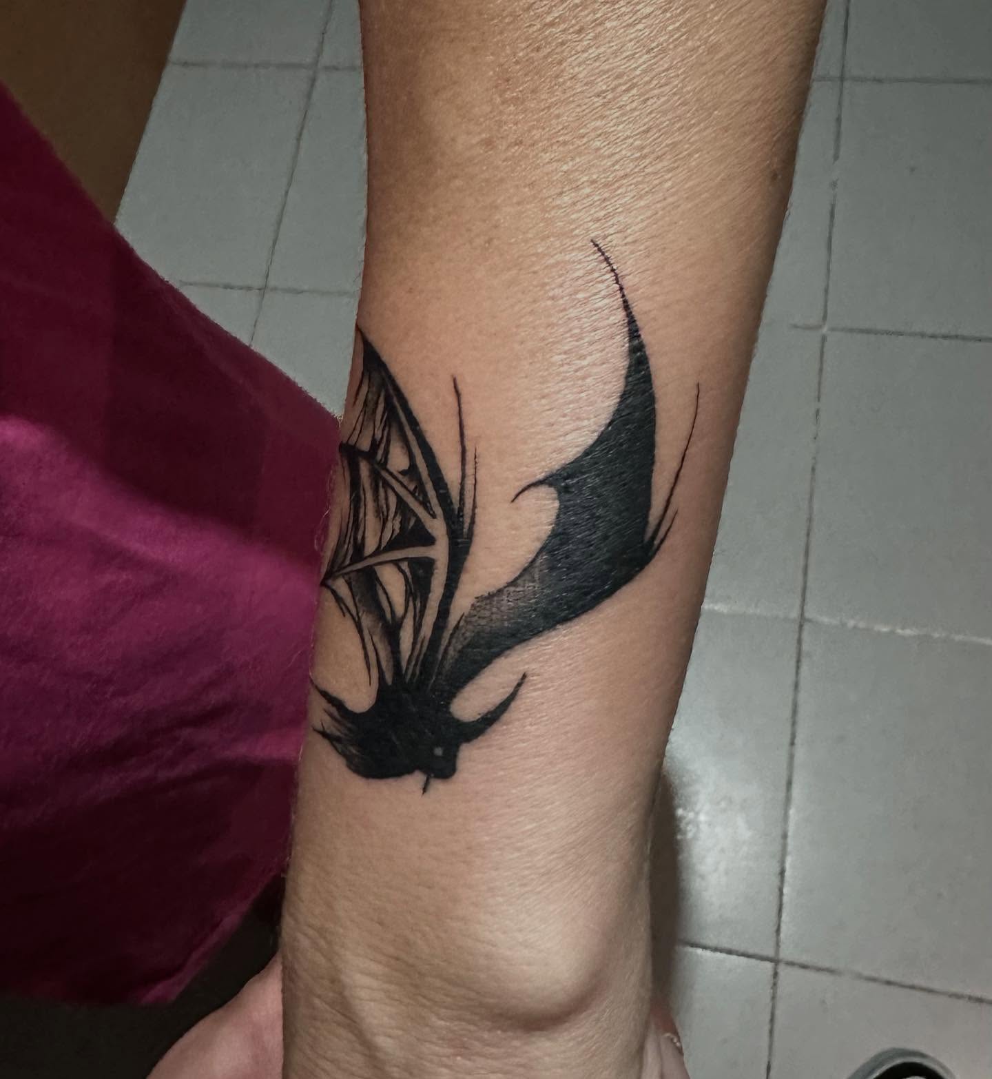 Bat black and grey tattoo on the forearm by Kunaytattoo