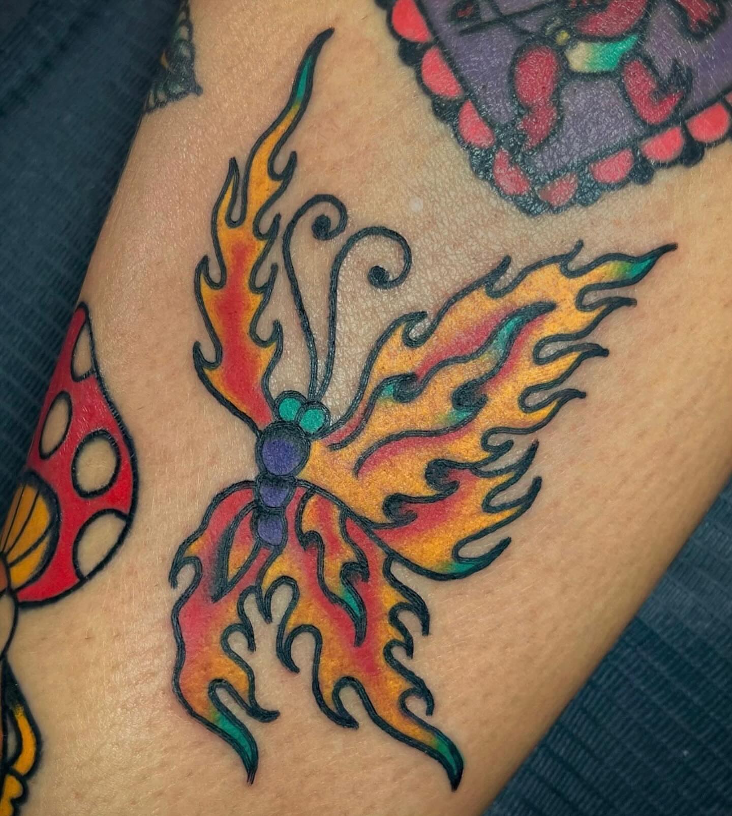 Flame butterfly new school tattoo on the forearm by Elizabeth Summers ❨・¨⬮ Traditional Tattoo