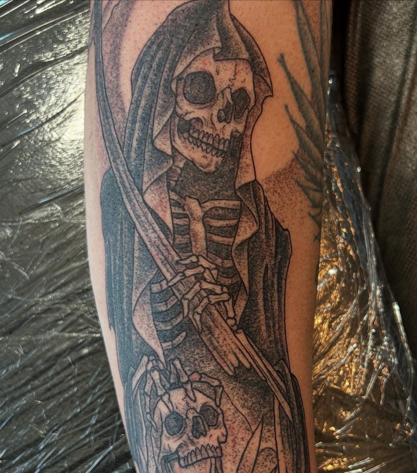 Grim reaper with skull realism tattoo on the forearm by Jaime Gaiti