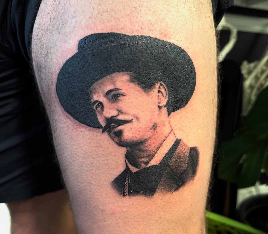 Realism tattoo on the thigh by Scout Meyer