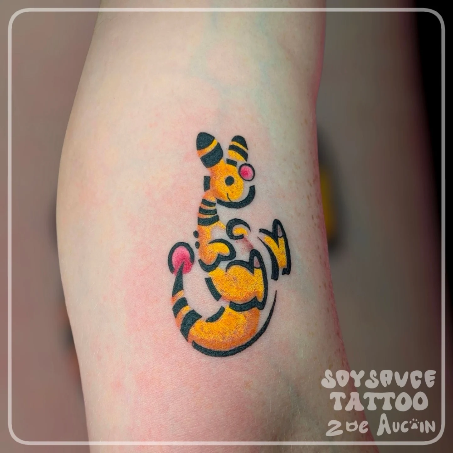 Tiger new school tattoo on the forearm by Zoe Aucoin