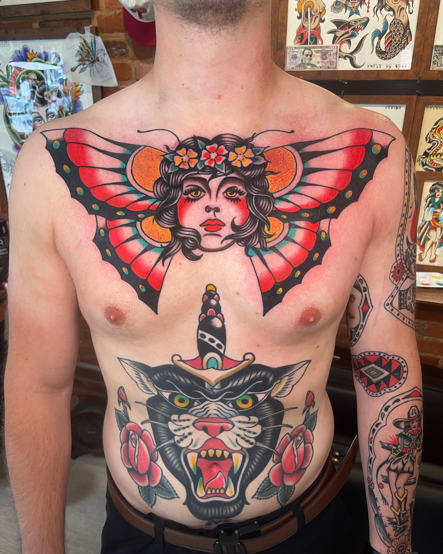 Woman with butterfly wings American traditional tattoo on the chest by Jeff Miller philly traditional tattoo
