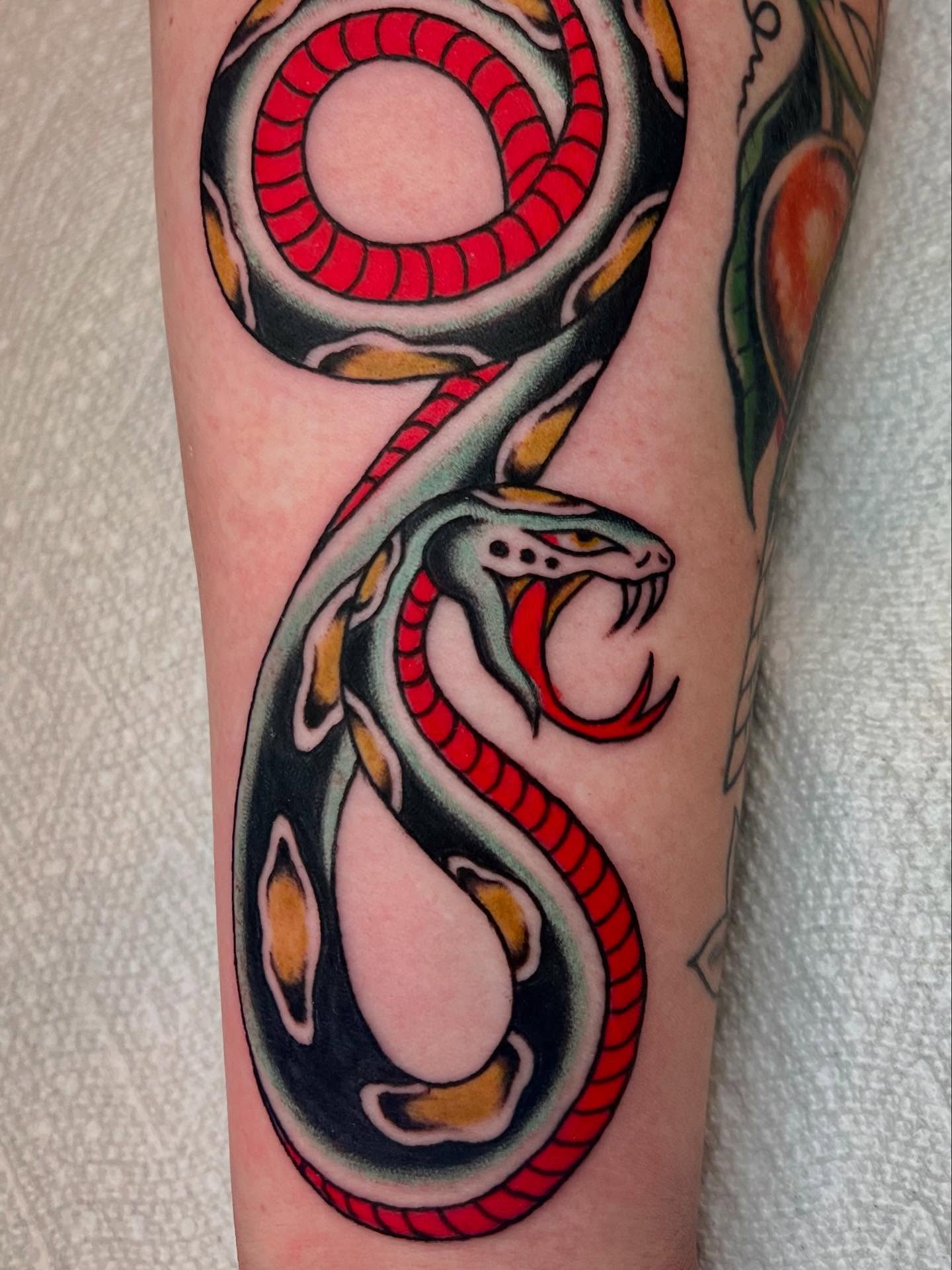 Snake American traditional tattoo on the forearm by Liv :)