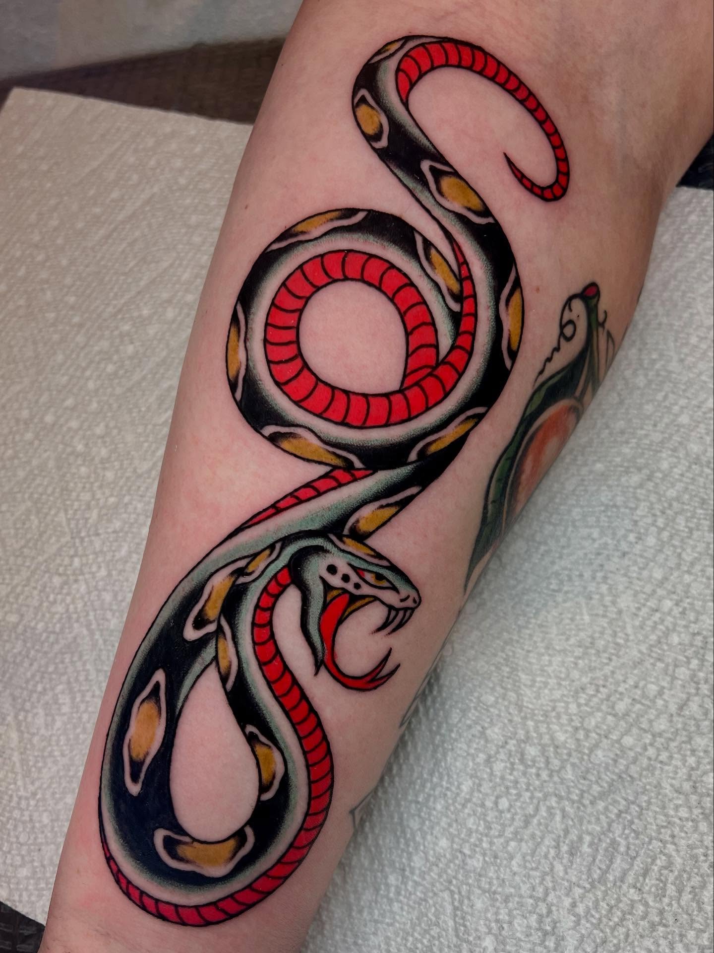 Snake American traditional tattoo on the forearm by Liv :)