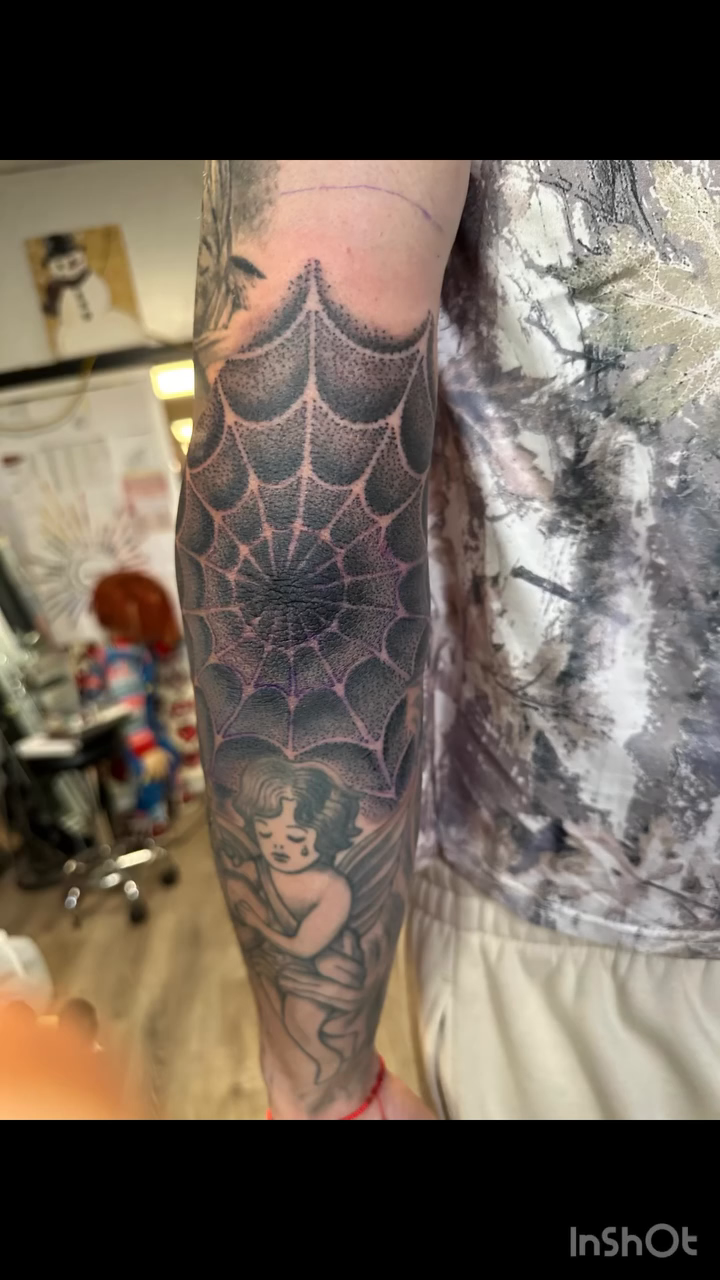 Spiderweb with pin-up girl realism tattoo by Juan c munoz jr, Chicago, Illinois
