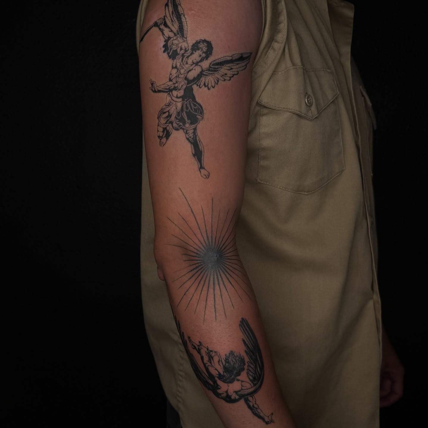 Angel with sword black and grey tattoo on the forearm by josselyn ☪︎