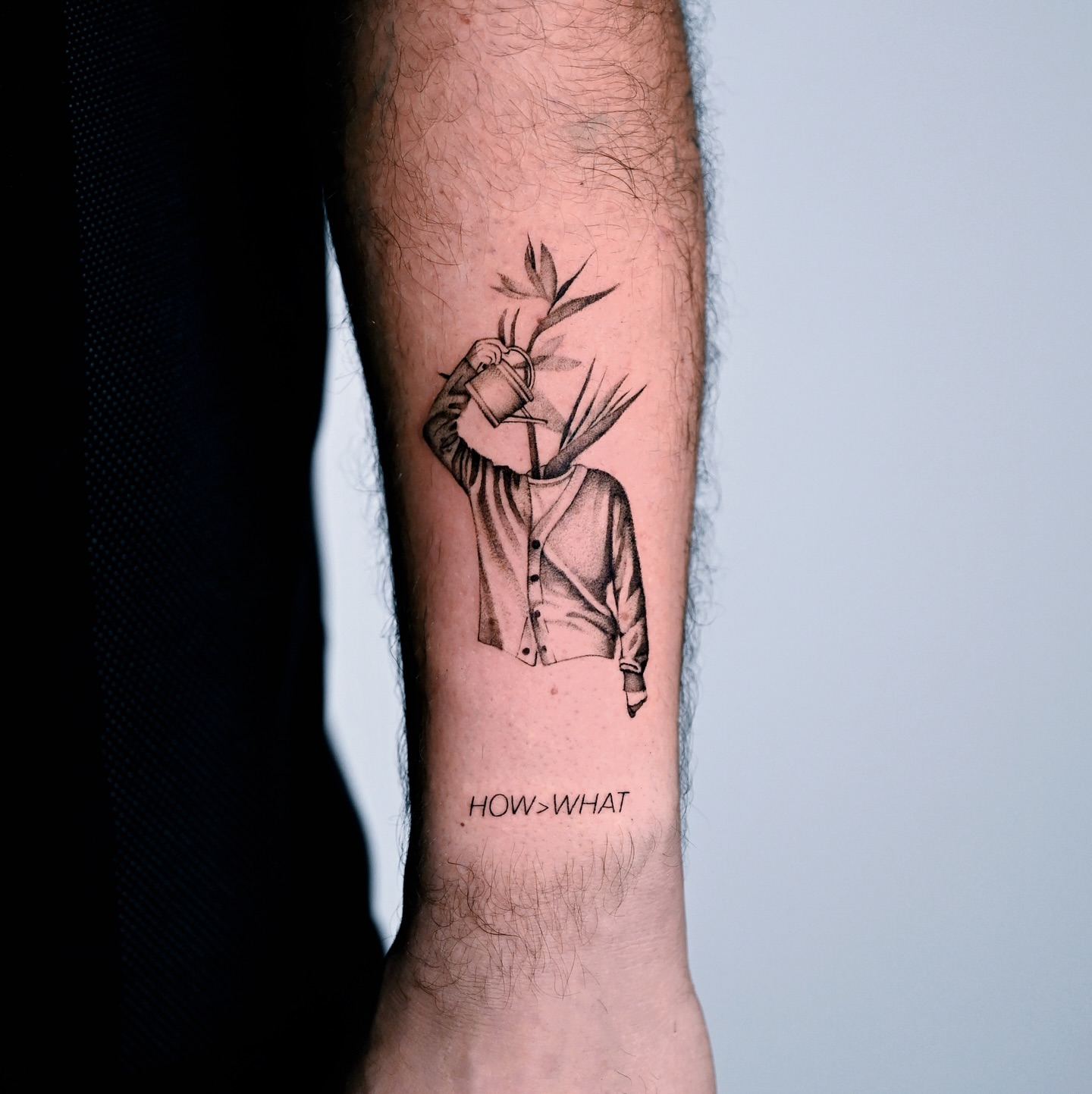 Man with plant head realism tattoo on the forearm by dom