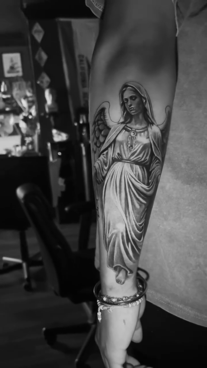Tattoo by @acruz_707 — realism, black_and_grey