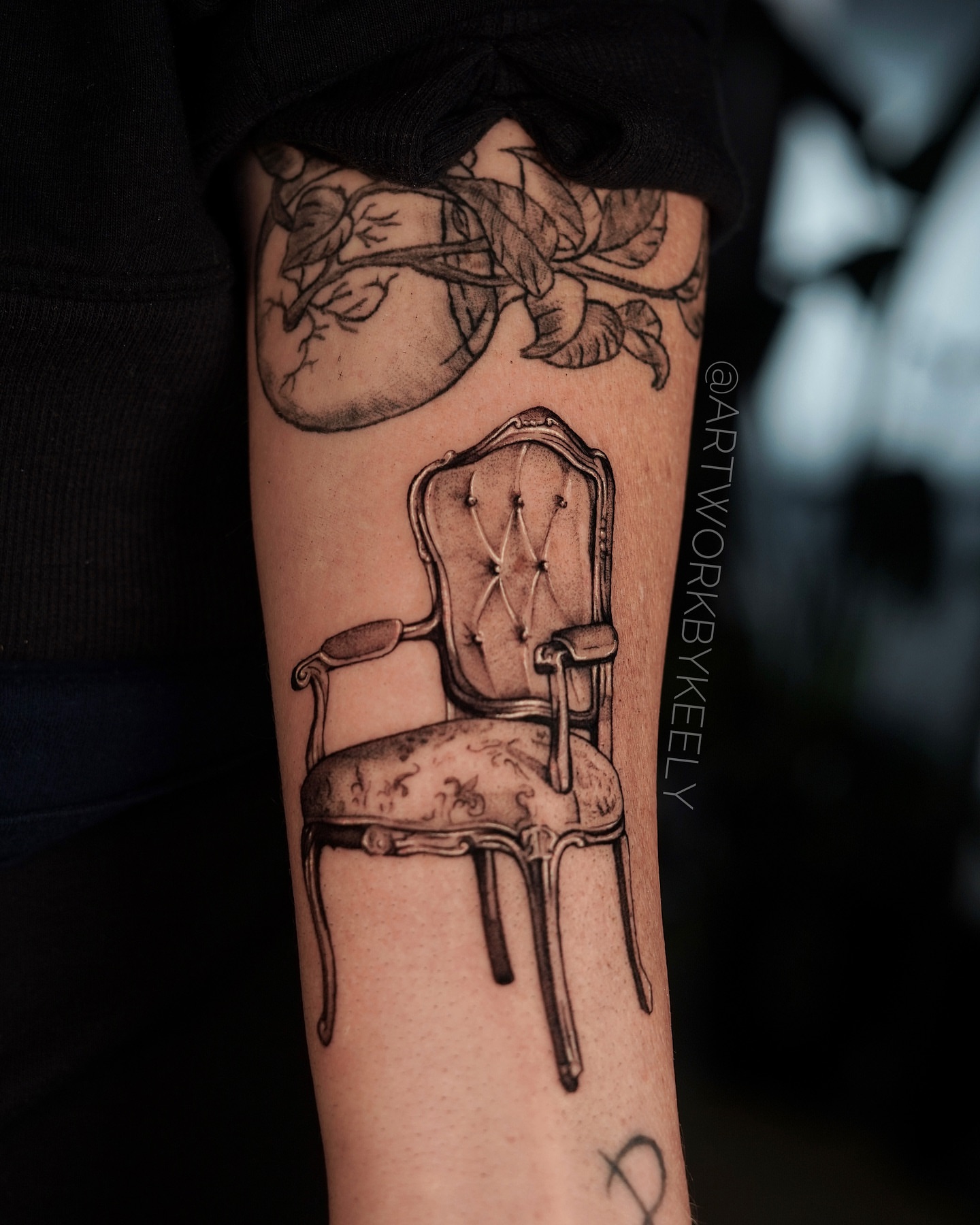 Chair realism tattoo on the forearm by Keely Thompson