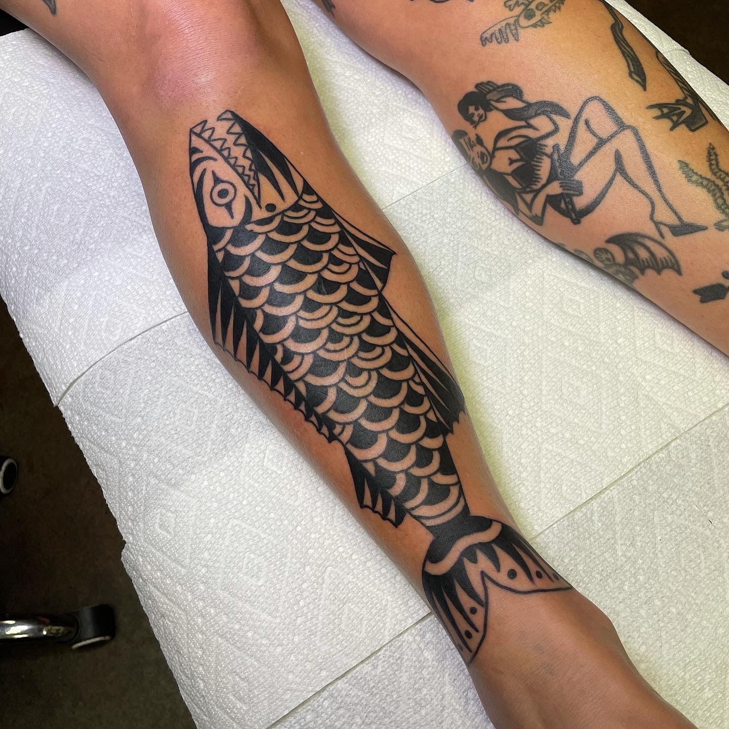 Fish American traditional tattoo on the forearm by เผ เผถ ๐ฐ๐๐๐๐๐๐ เผถ ๐๐๐ถ เผถ เผ