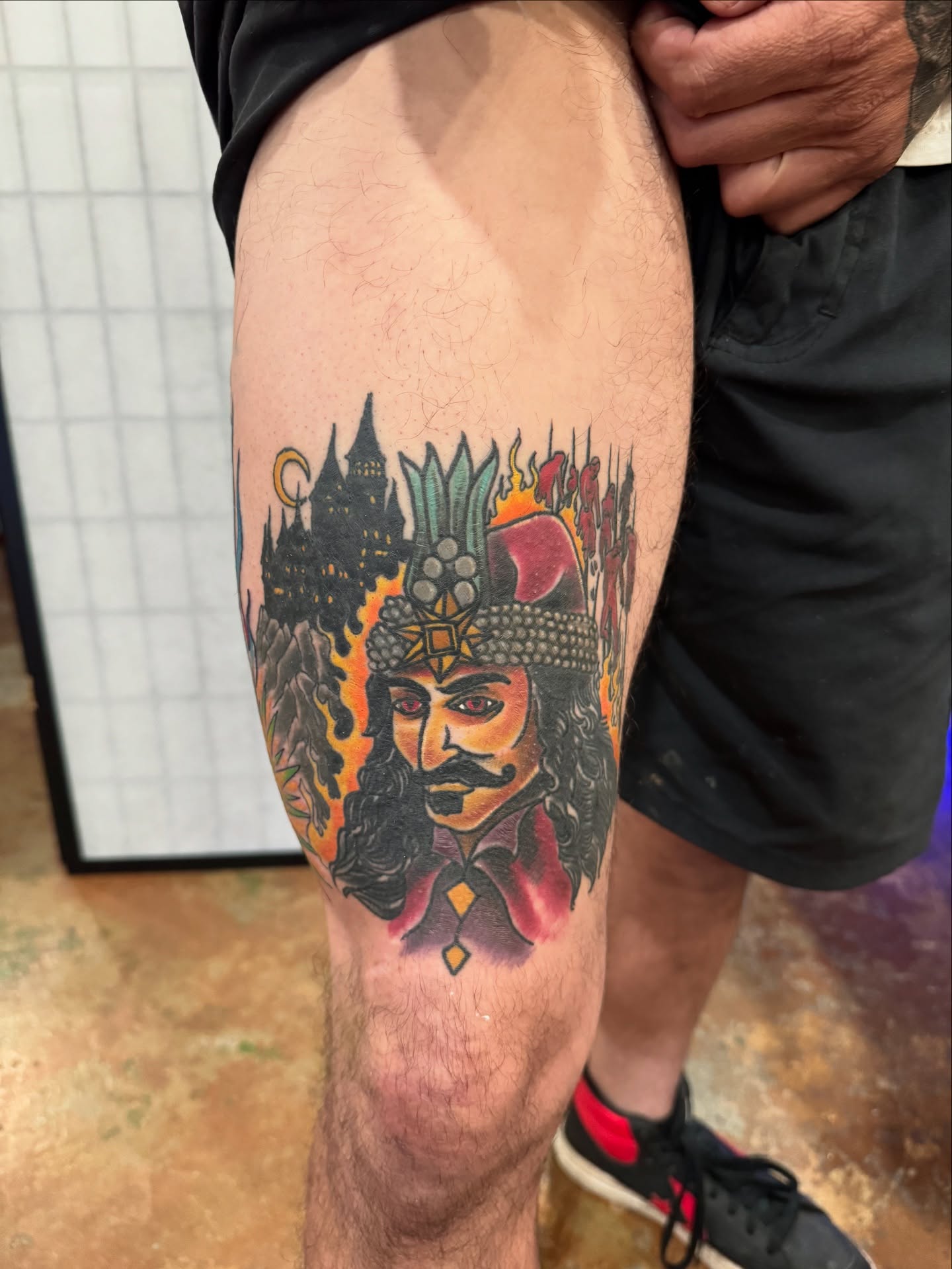 Portrait of a man American traditional tattoo on the thigh by David C. McGhee