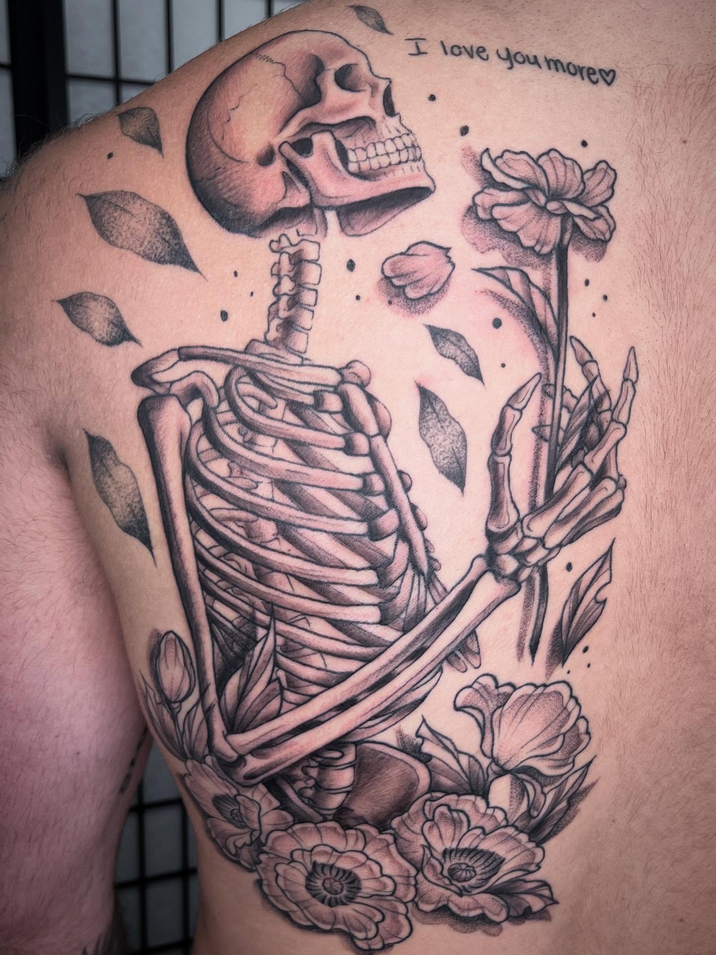 Skeleton with flowers realism tattoo on the shoulder by Kat (Scout) Bogart