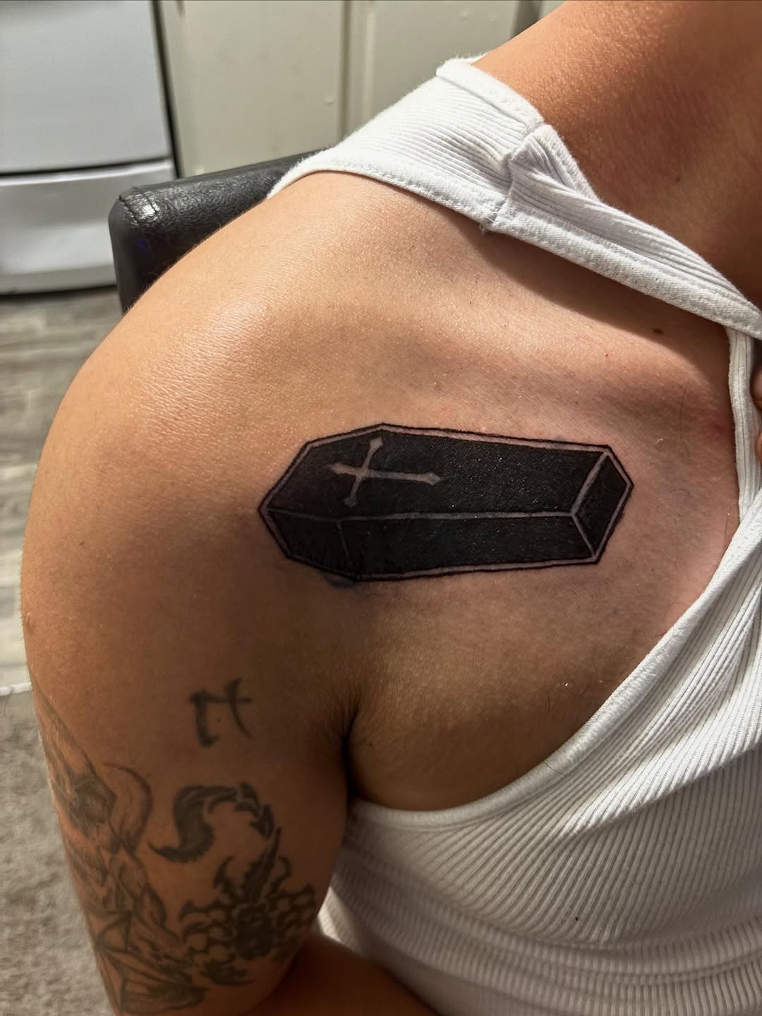 Coffin with cross tattoo on the shoulder by Ink_ Hustle36