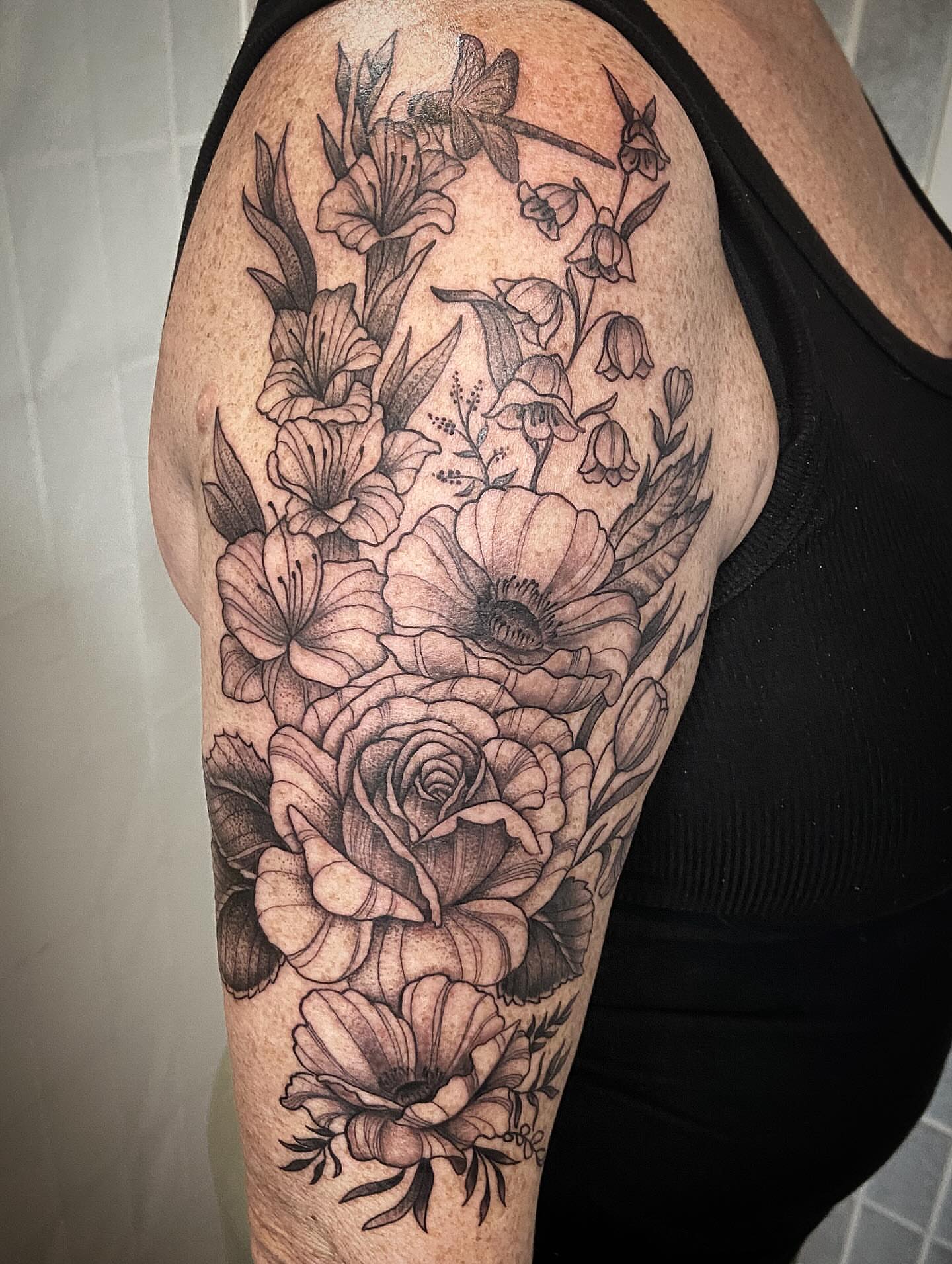 Floral bouquet realism tattoo on the shoulder by Tattoos by Dale Hupke, Lebanon, Ohio