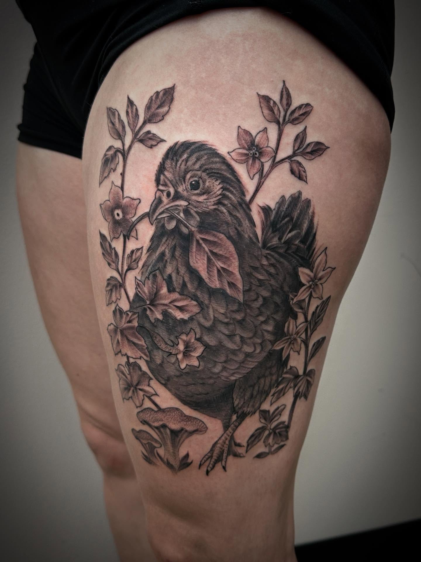 Chicken and flowers realism tattoo on the thigh by Heather Tattoos Danvers MA